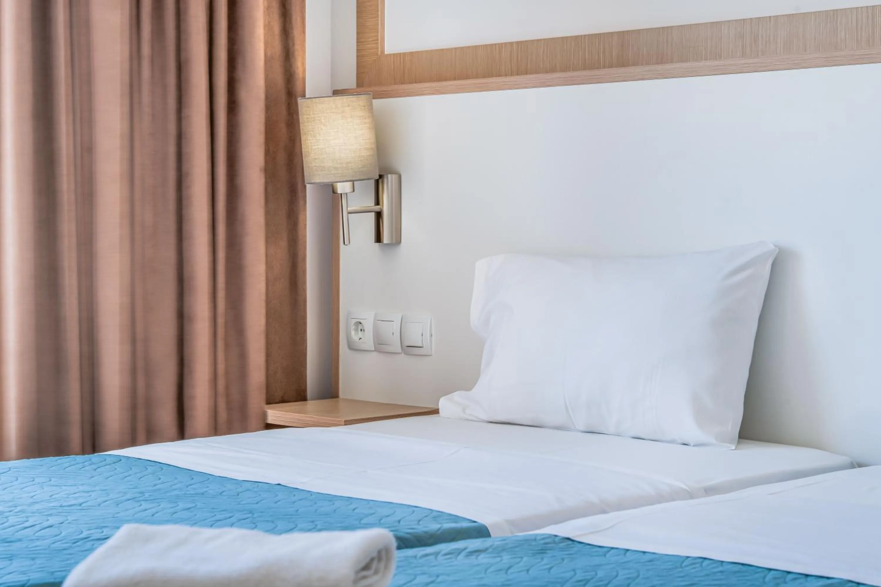 Bed in Creta Verano Hotel