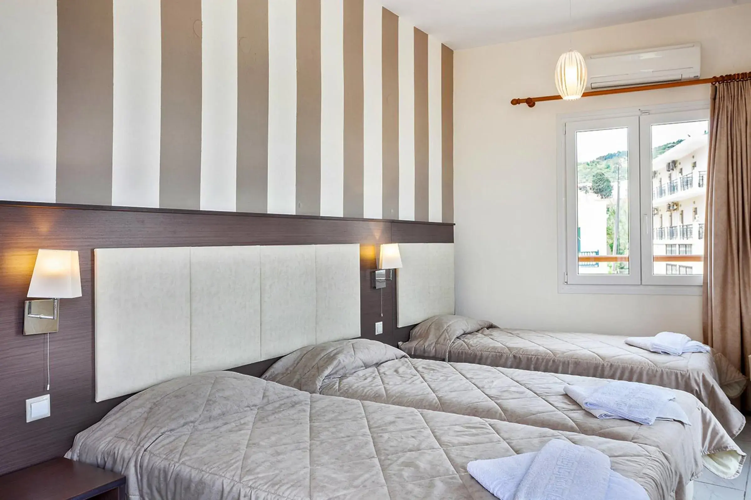 Triple Room in Akti Fine Rooms Triple Room in Akti Fine Rooms