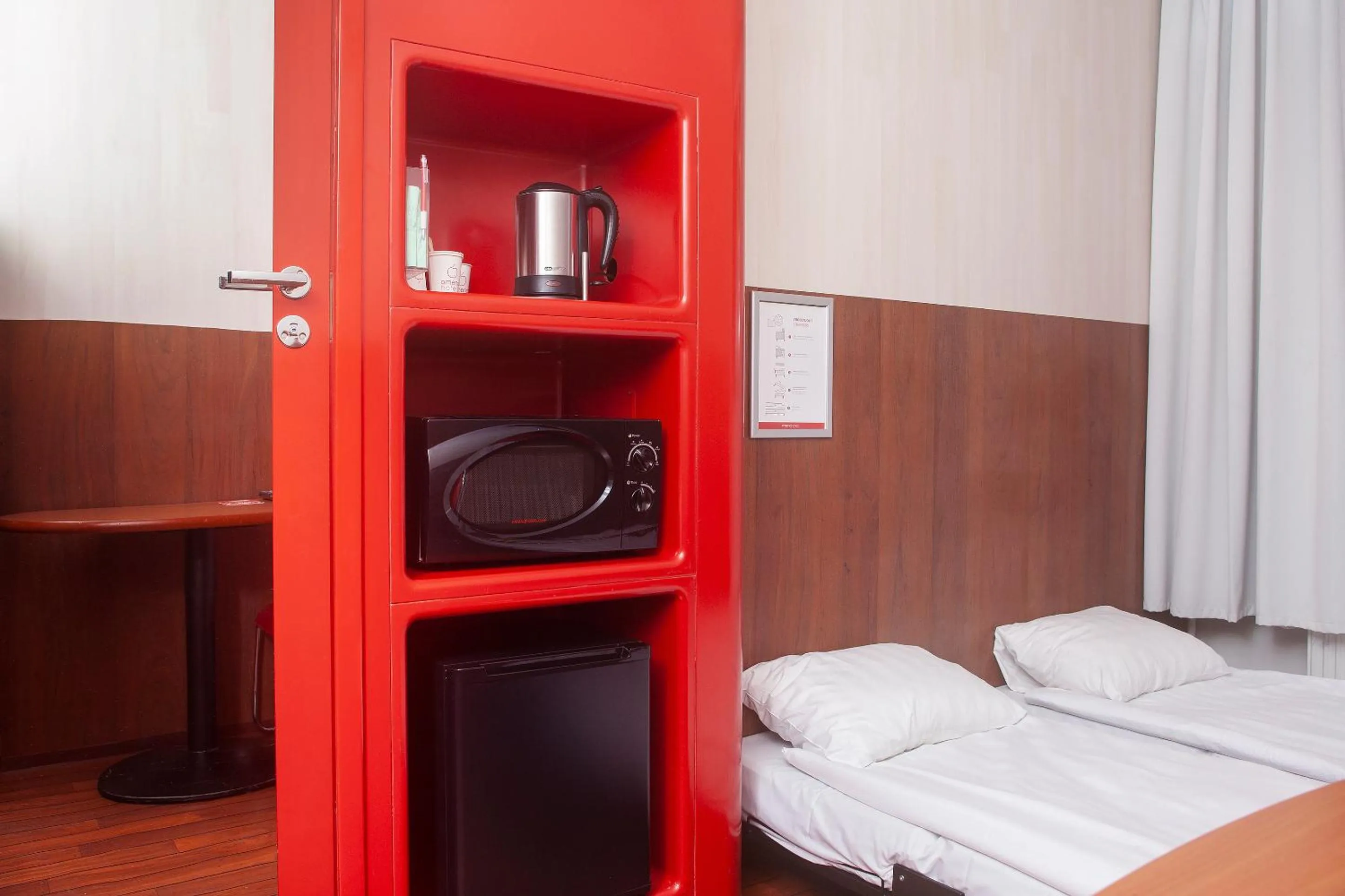 Kitchen or kitchenette, Bed in Omena Hotel Helsinki City Centre