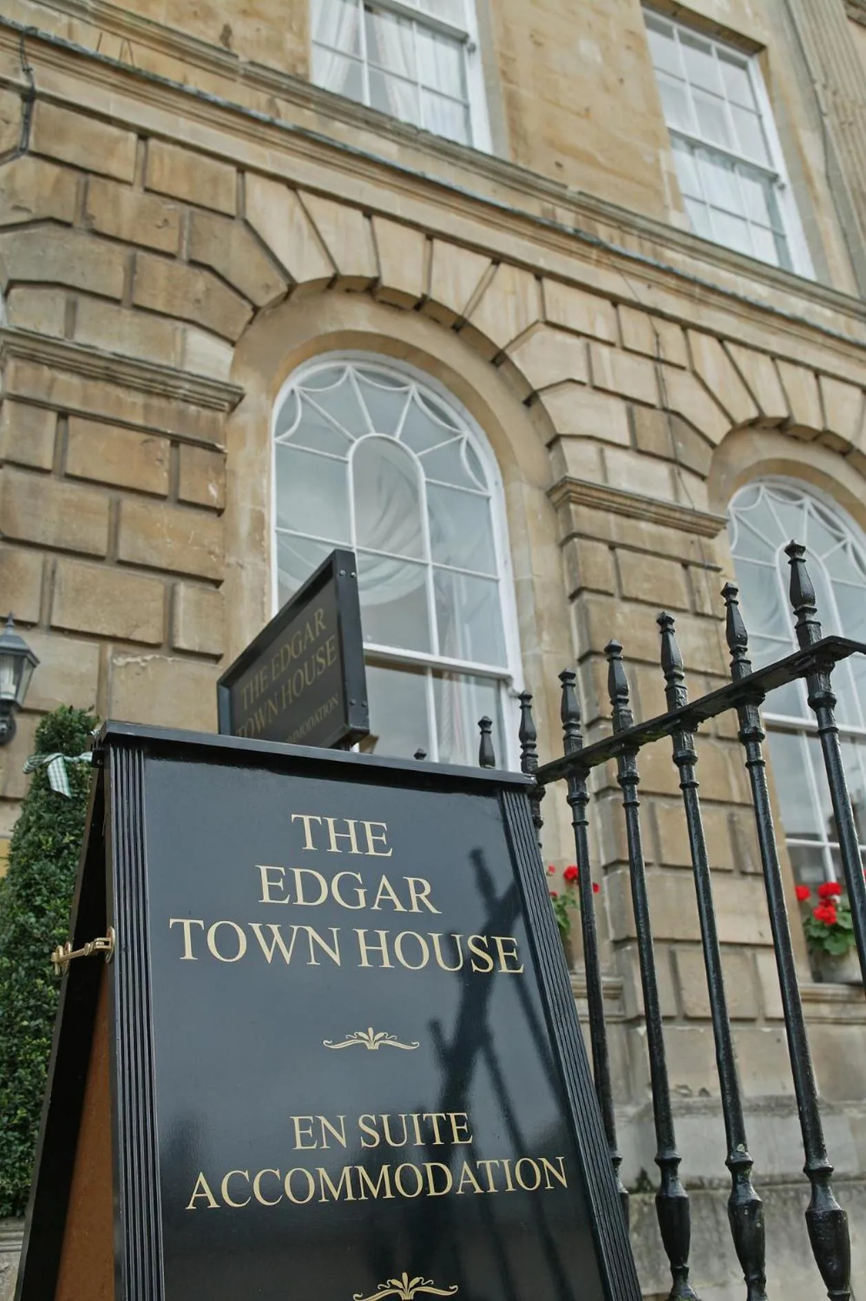 Property logo or sign in Edgar Townhouse