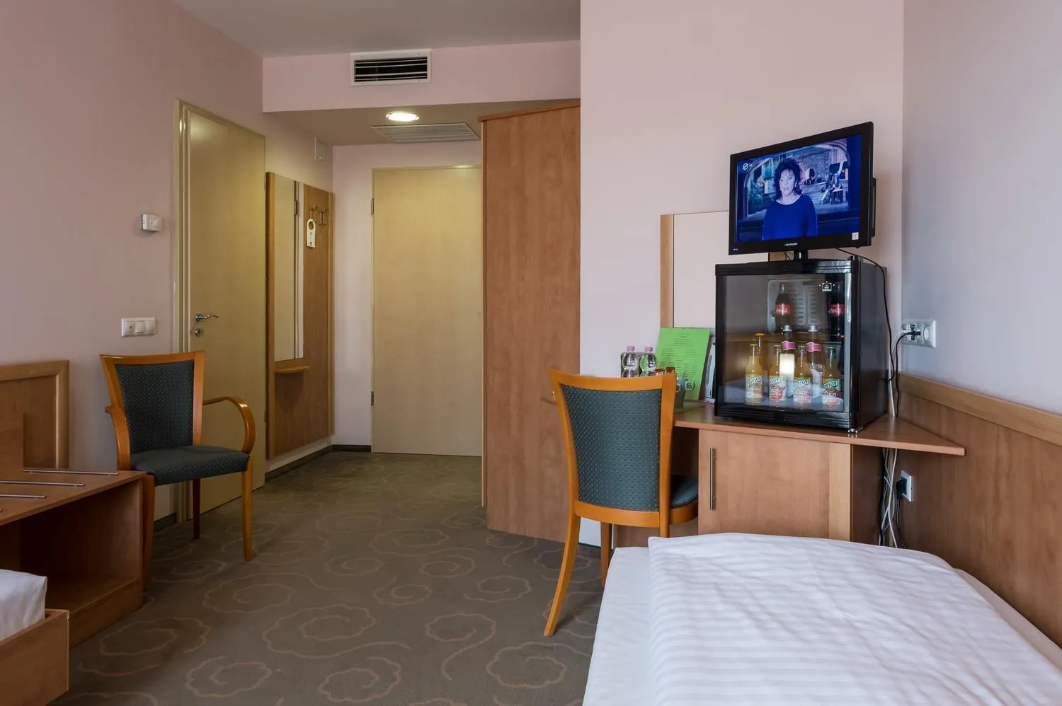 Bedroom in Semiramis Business Hotel