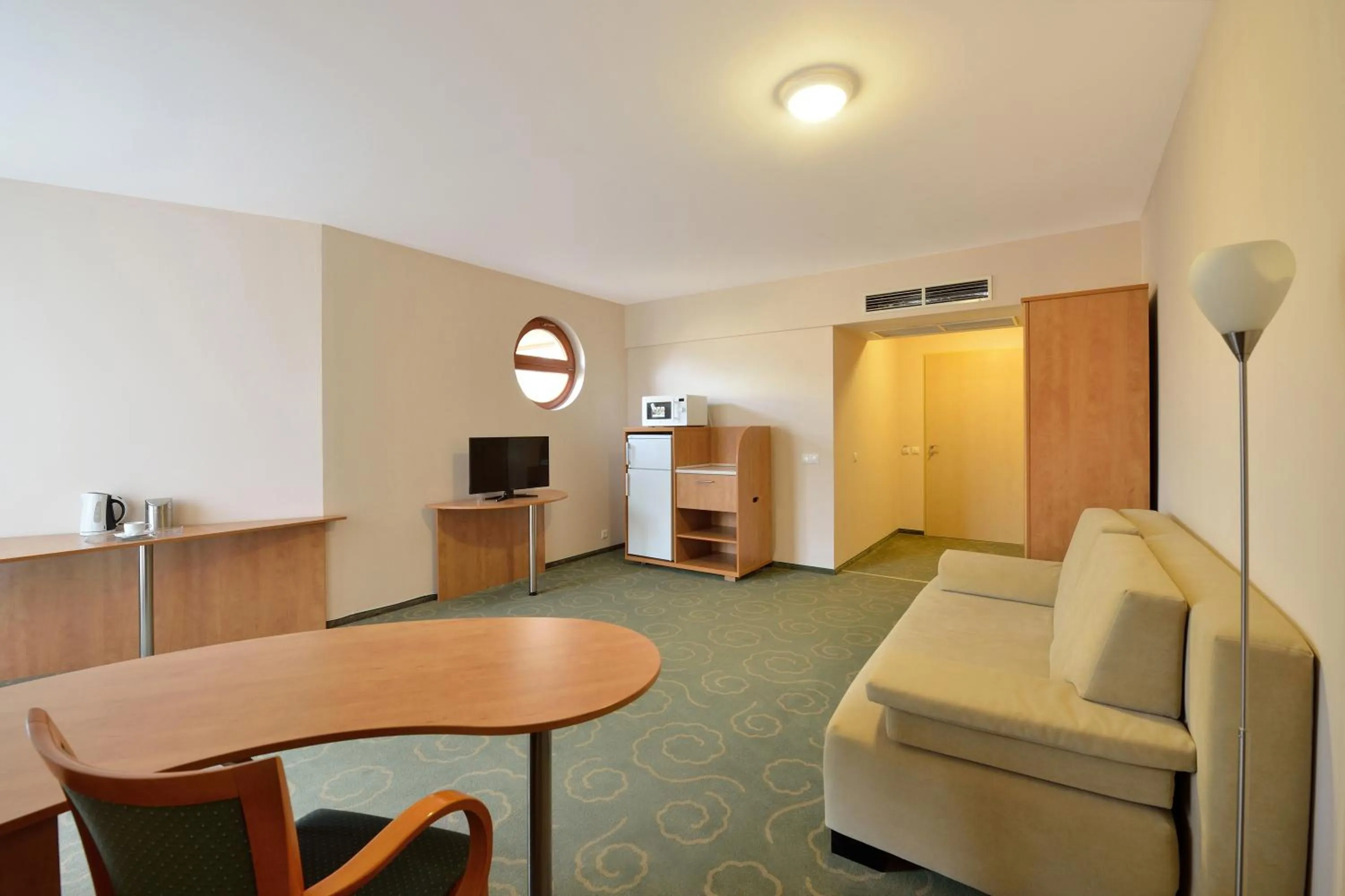 Living room in Semiramis Business Hotel