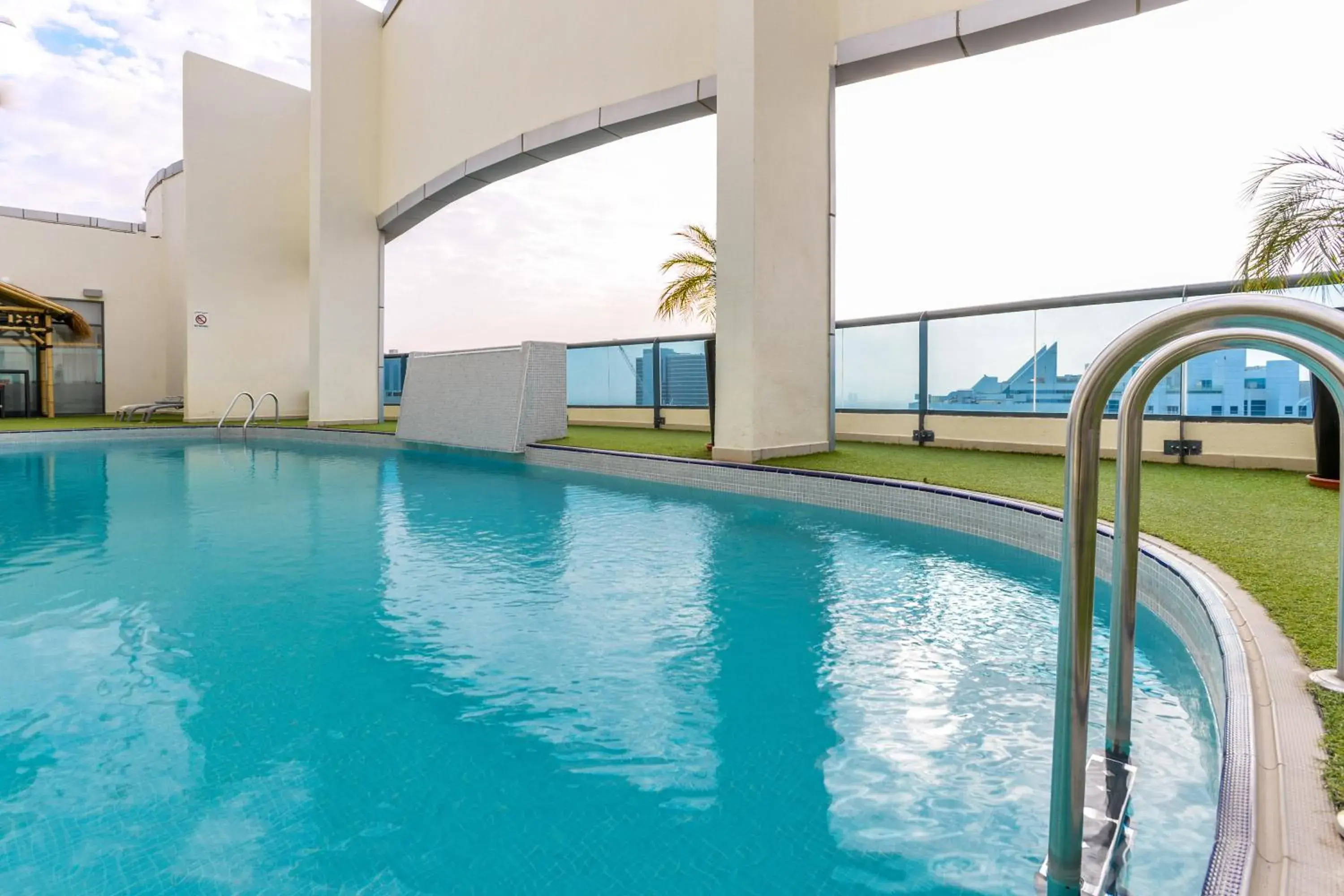 Swimming pool in First Central Hotel Suites Swimming pool in First Central Hotel Suites