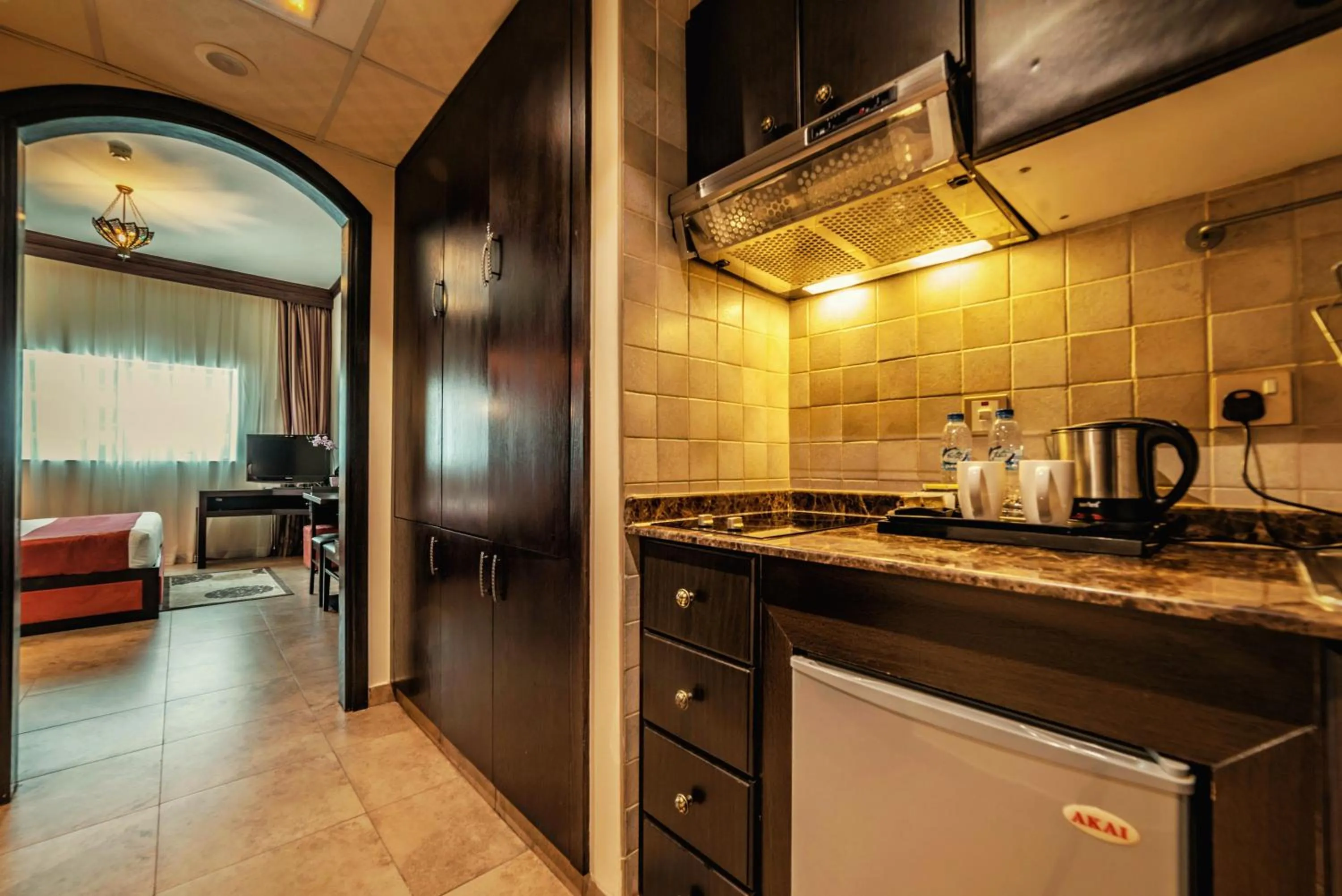 Coffee/tea facilities in First Central Hotel Suites