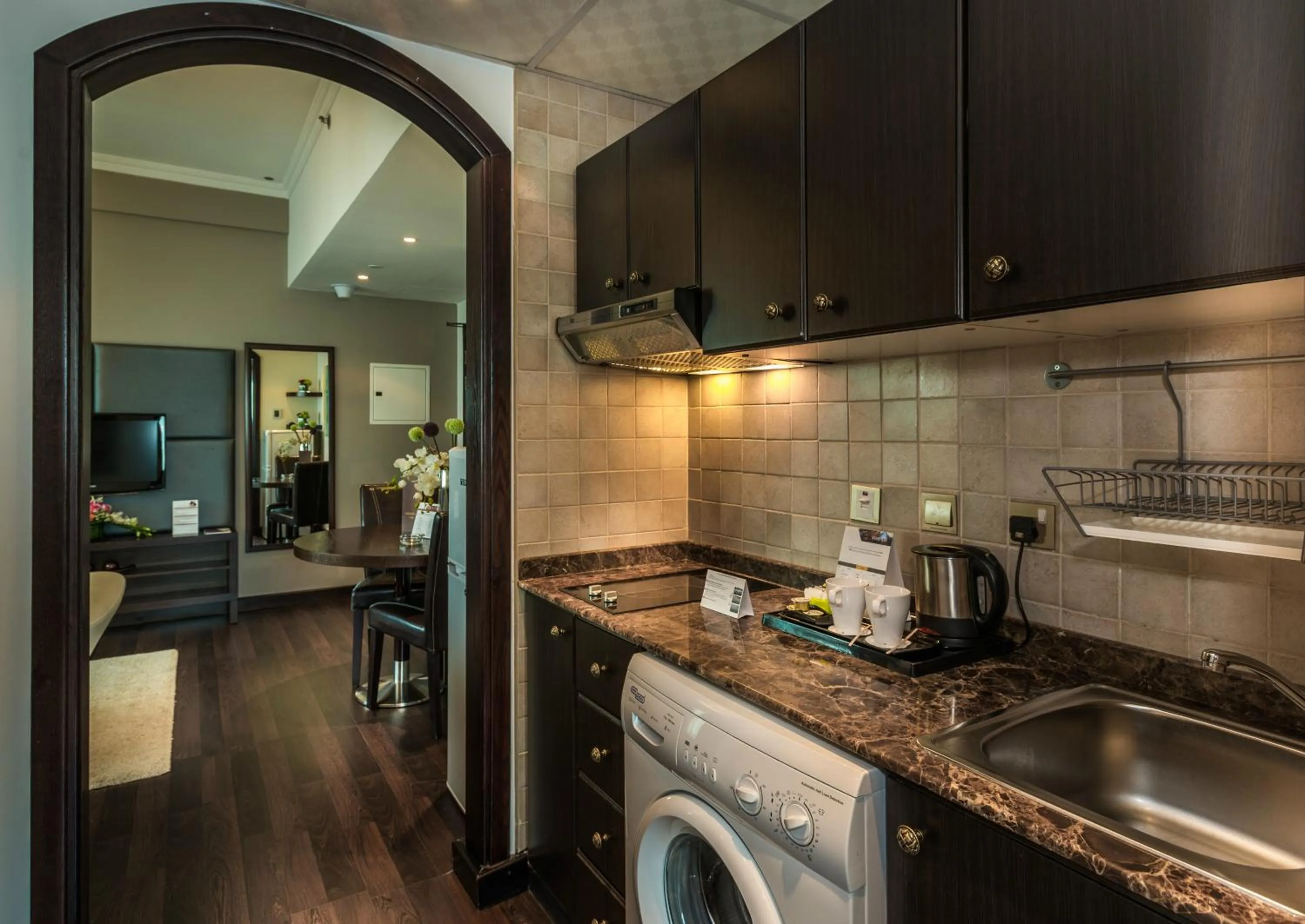 Kitchen or kitchenette in First Central Hotel Suites