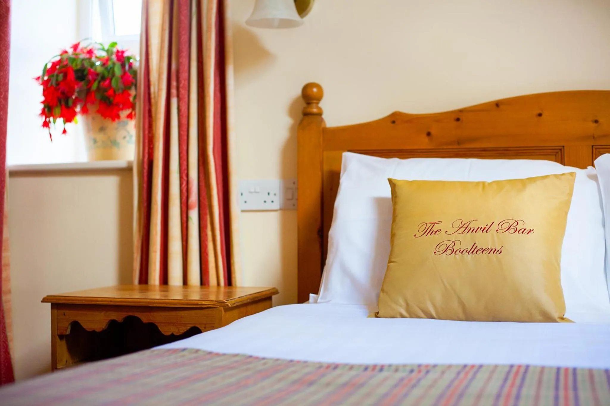 Bed in The Anvil Bar B&B