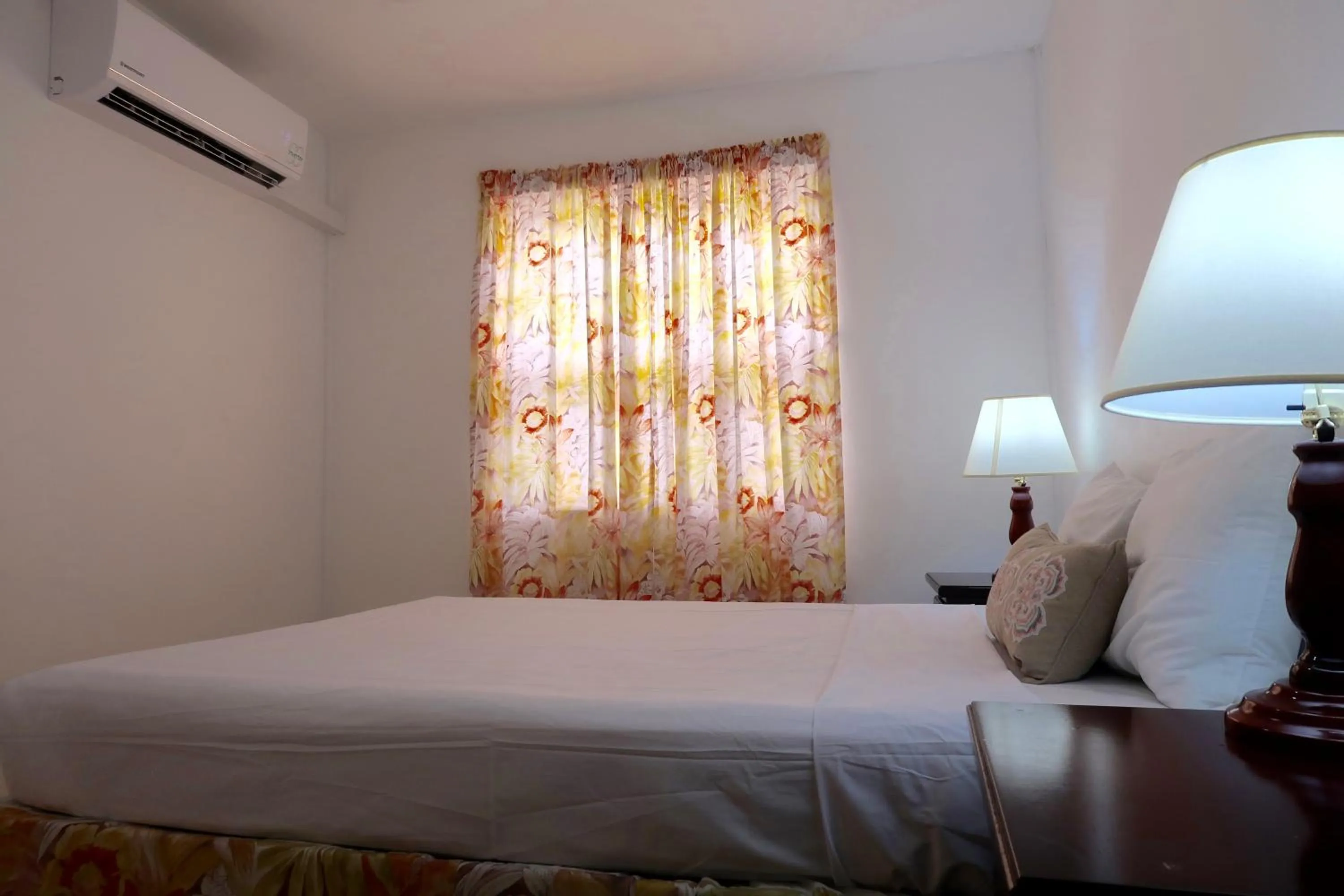 Bed in Adulo Apartments