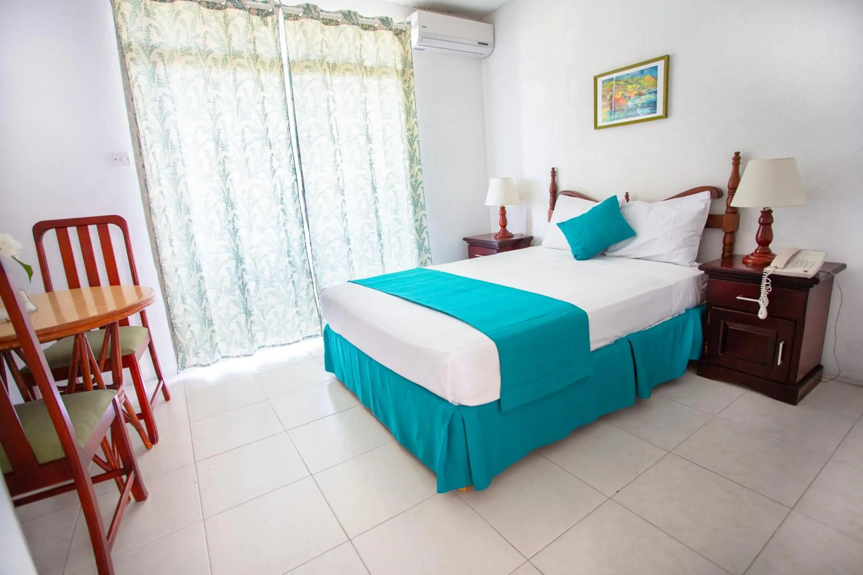 Patio, Bed in Adulo Apartments Patio, Bed in Adulo Apartments