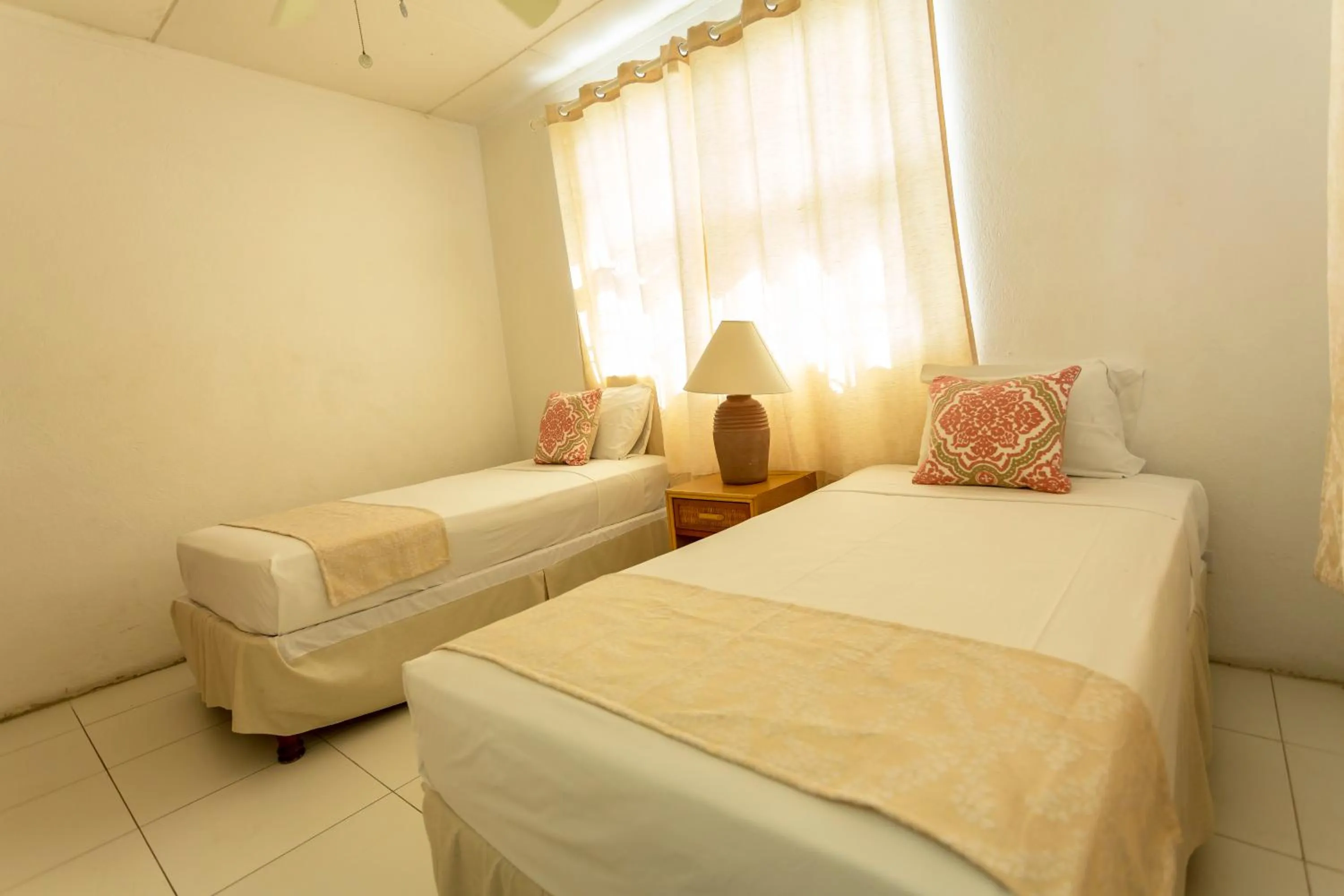 Bed in Adulo Apartments