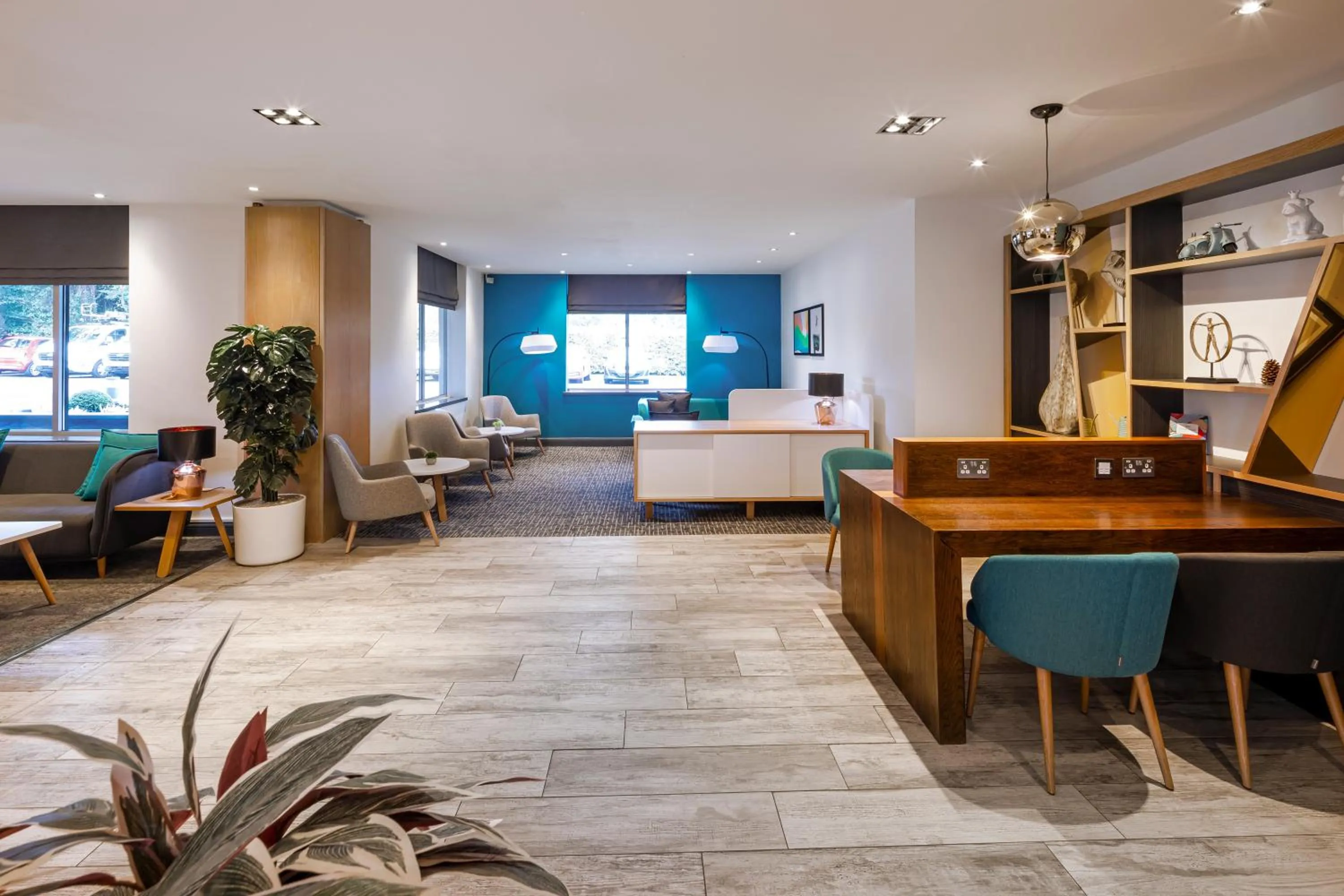 Communal lounge/ TV room in Holiday Inn High Wycombe M40, Jct.4 by IHG