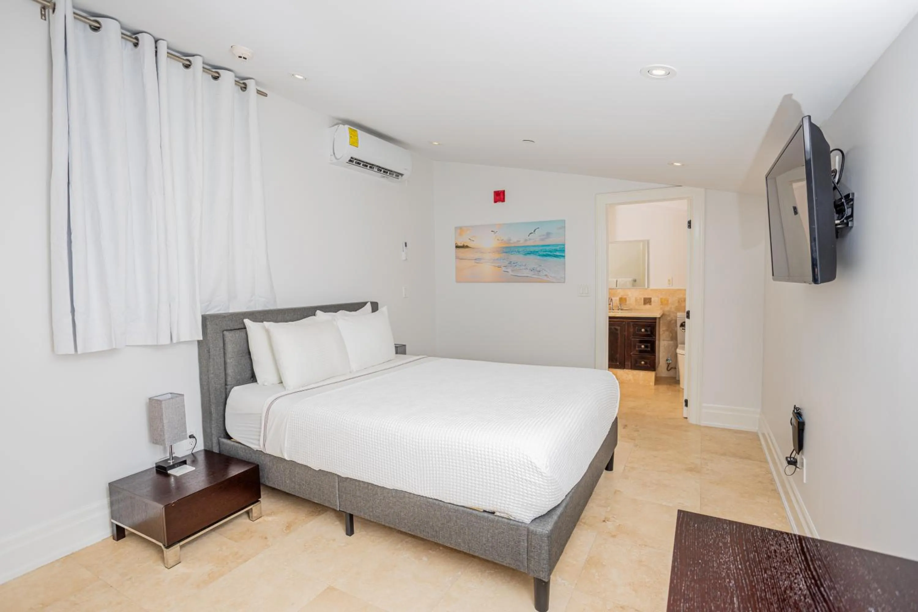 Bed in The Atrium Resort