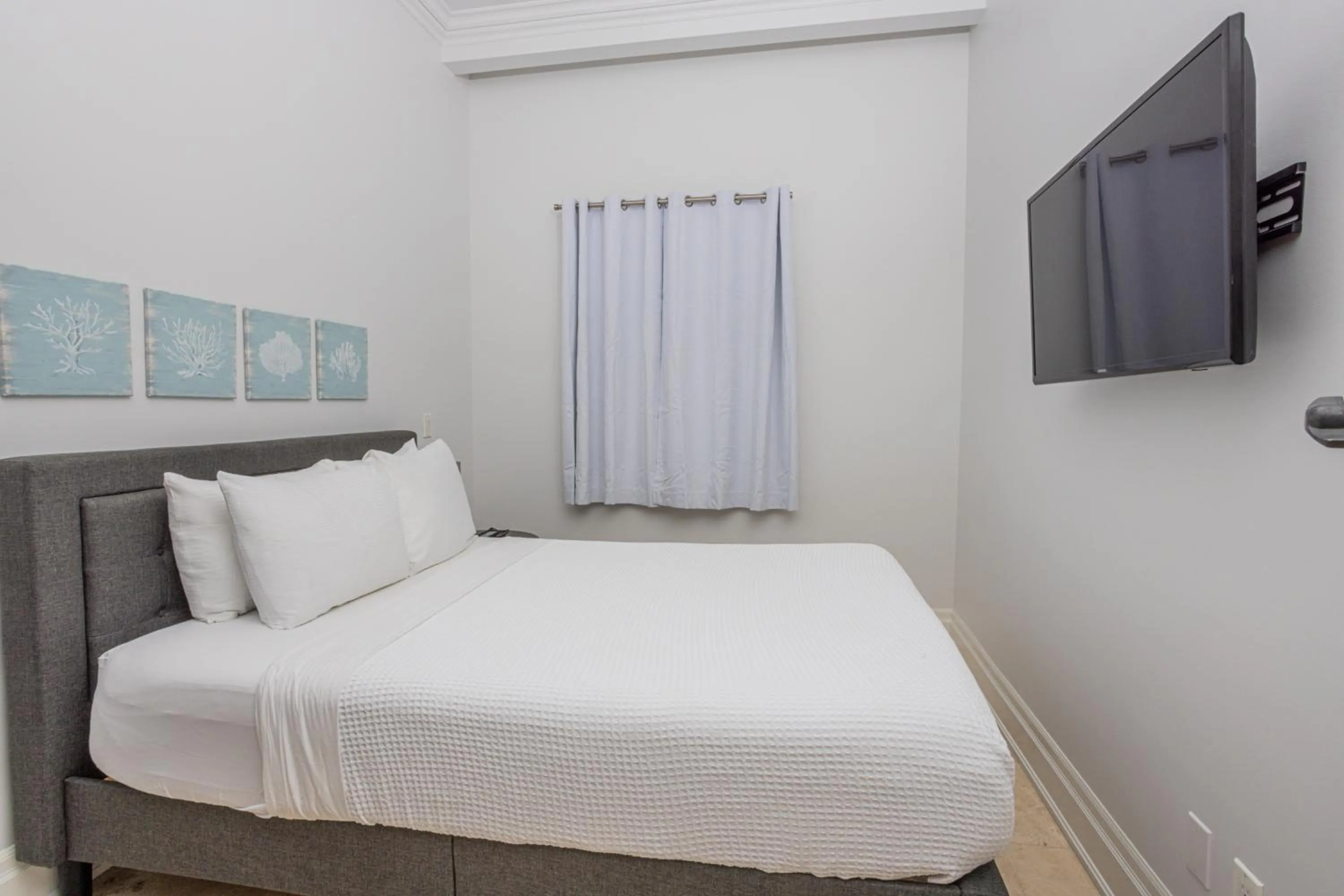 Bed in The Atrium Resort