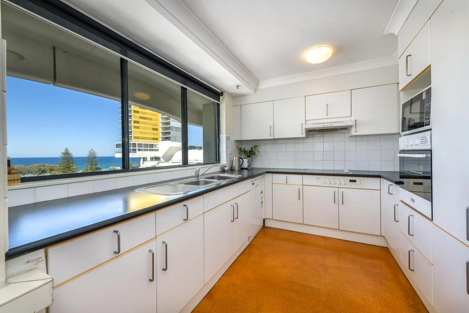 Kitchen or kitchenette in Victoria Square Apartments