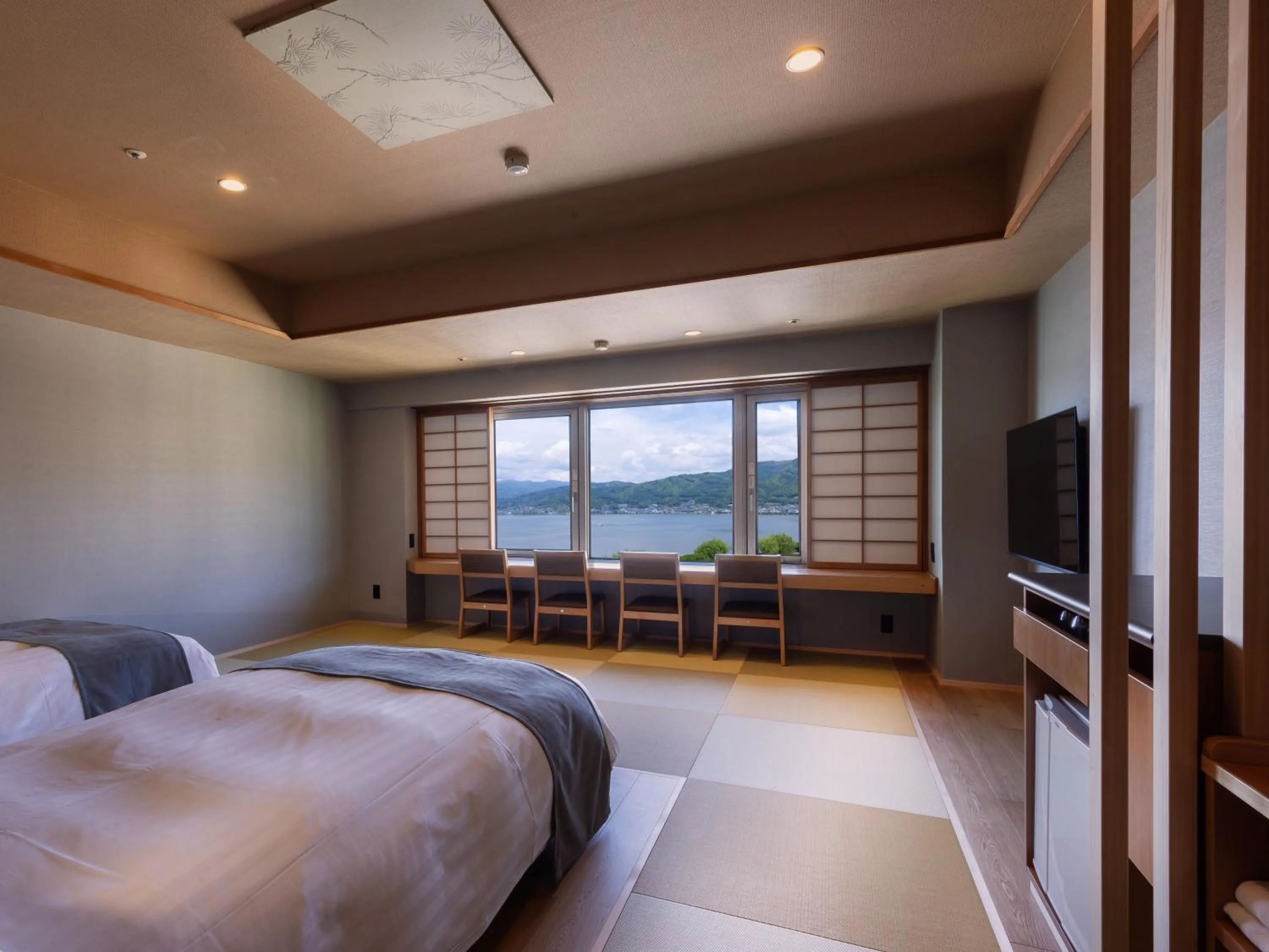 Bed in Rako Hananoi Hotel