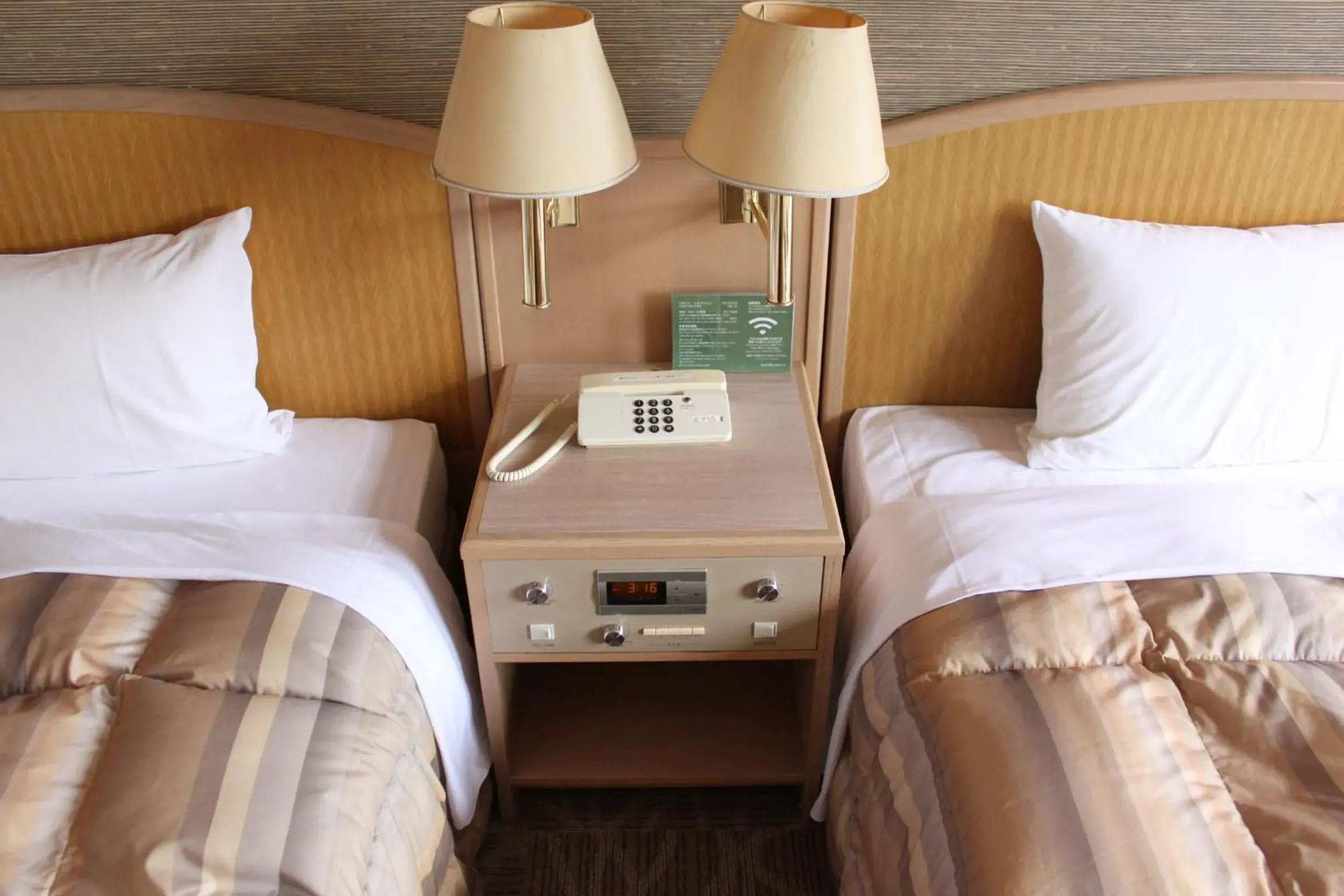 Bed in Rako Hananoi Hotel Bed in Rako Hananoi Hotel