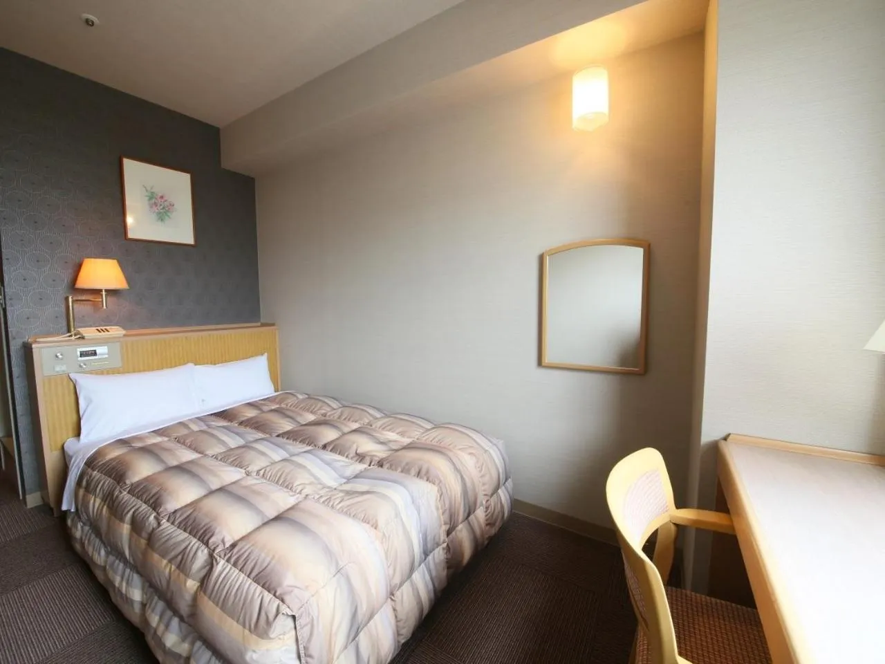 Bed in Rako Hananoi Hotel