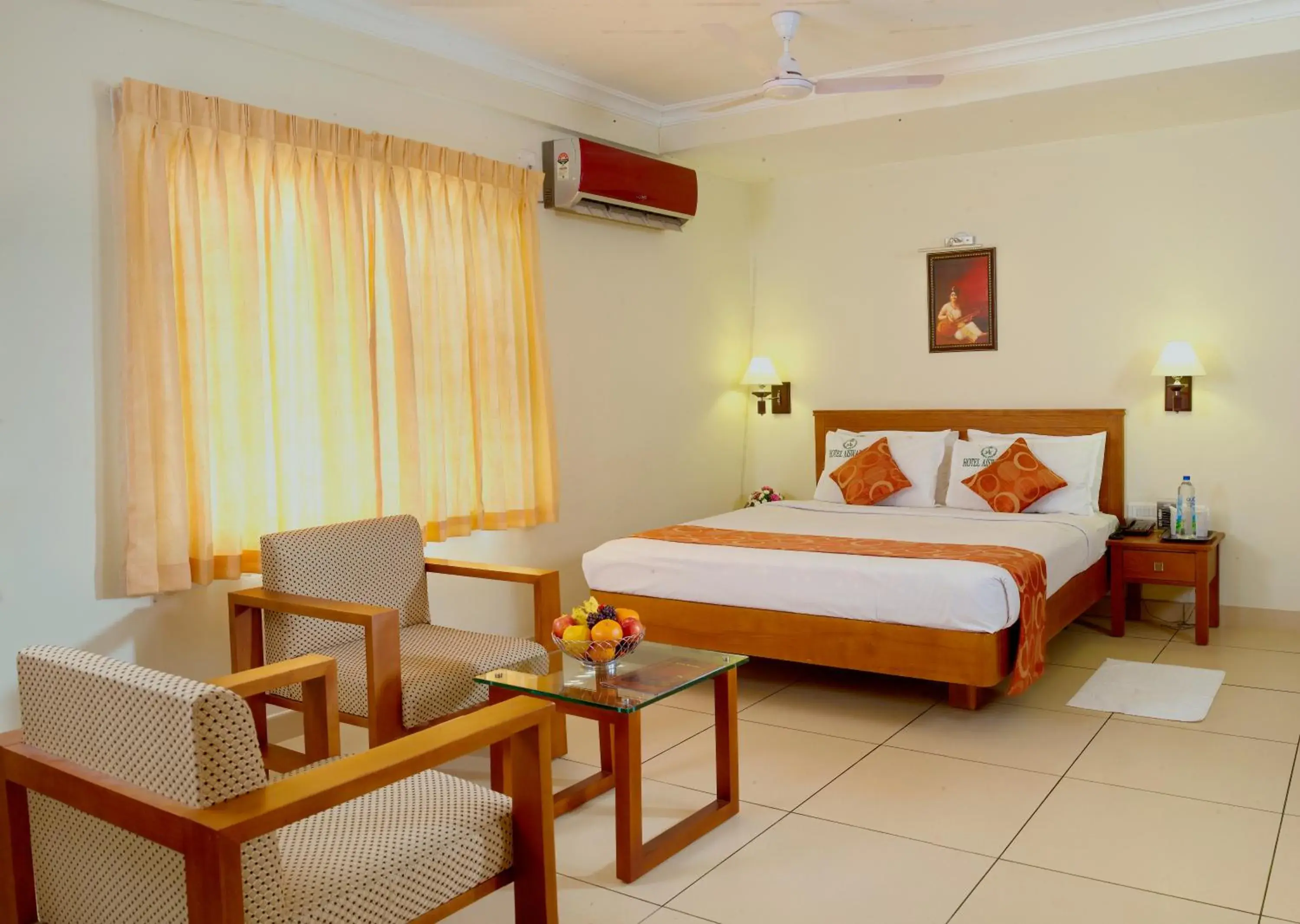 Seating area, Bed in Hotel Aiswarya Seating area, Bed in Hotel Aiswarya