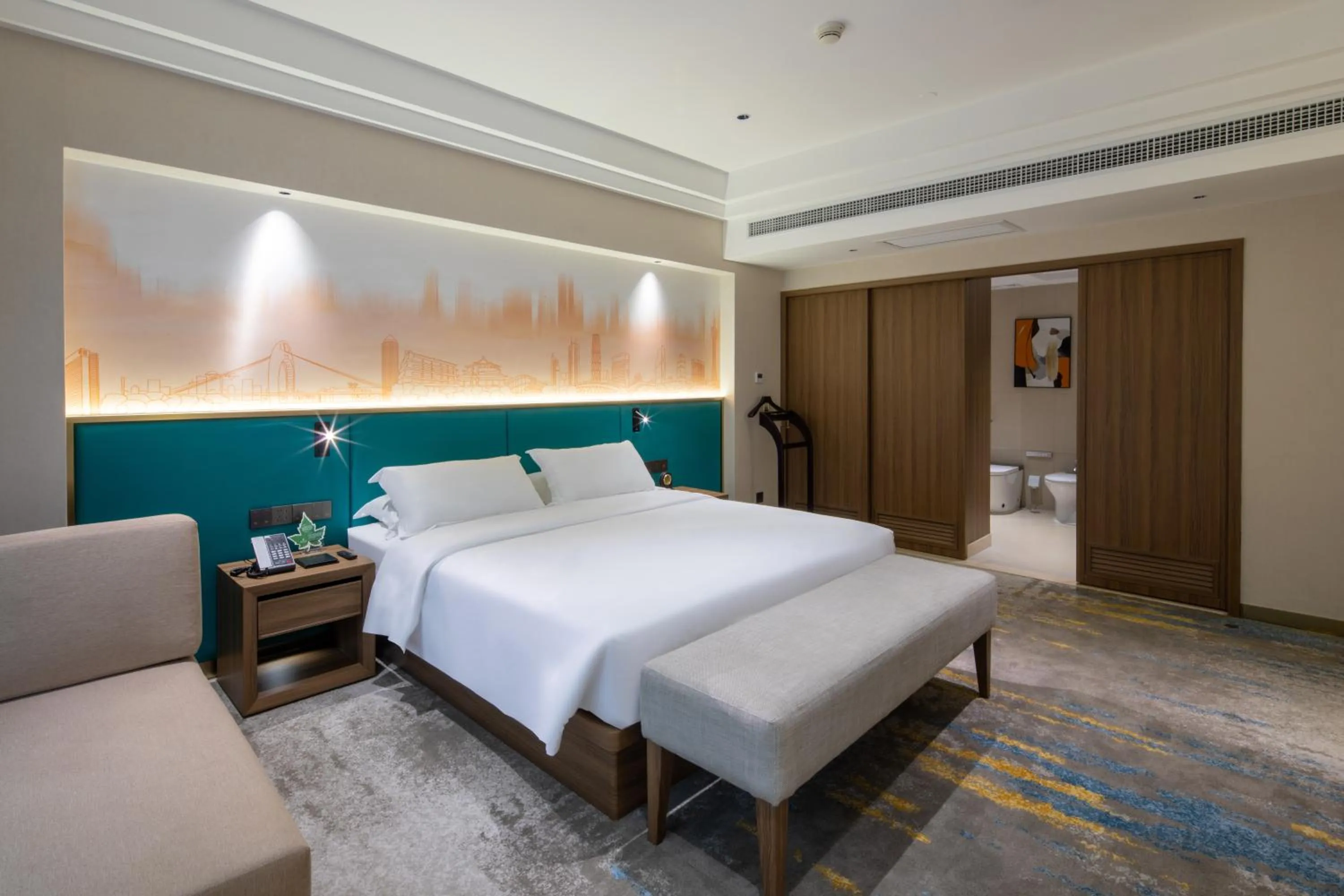 Photo of the whole room, Bed in Landmark International Hotel