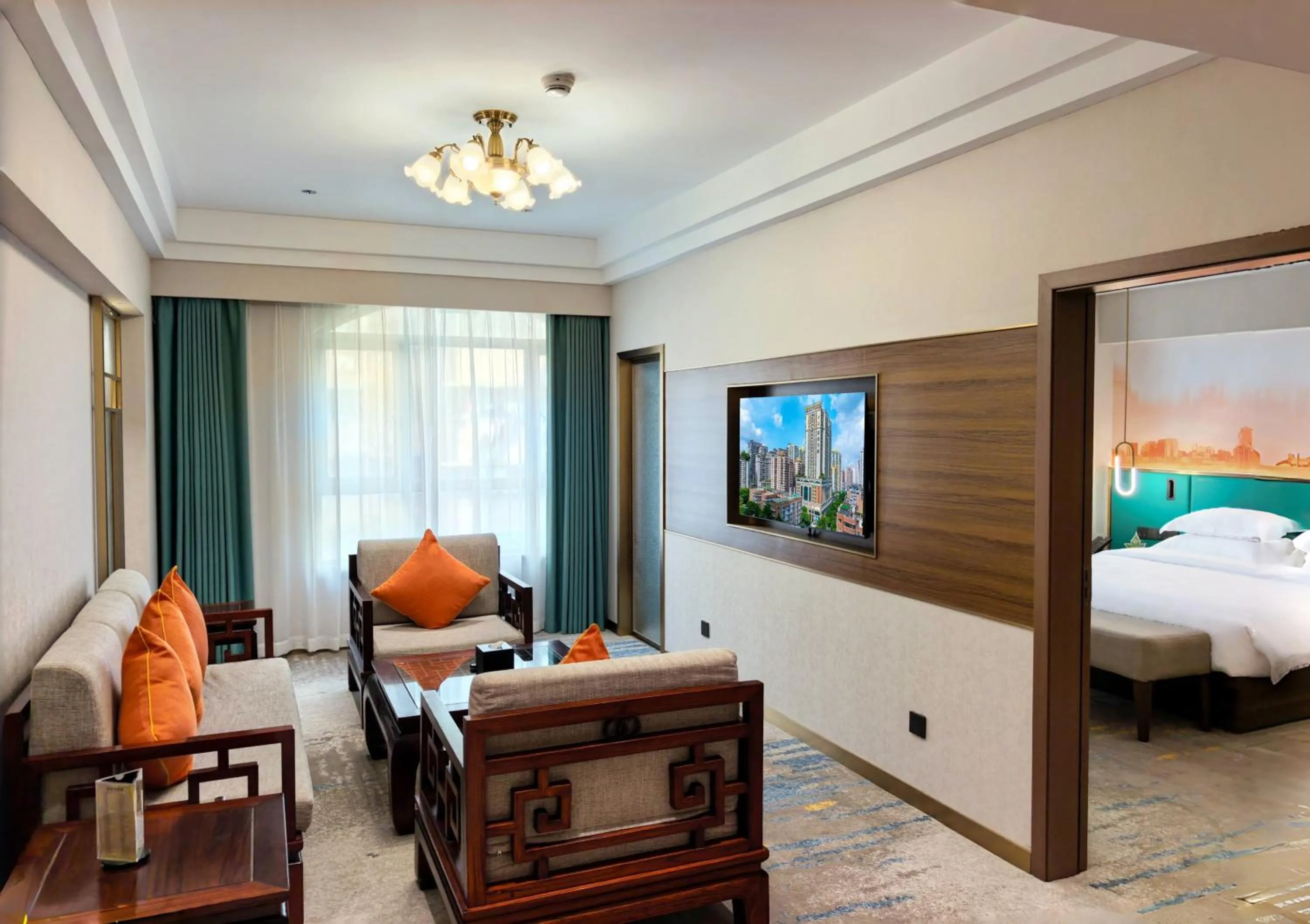 Living room, Bed in Landmark International Hotel