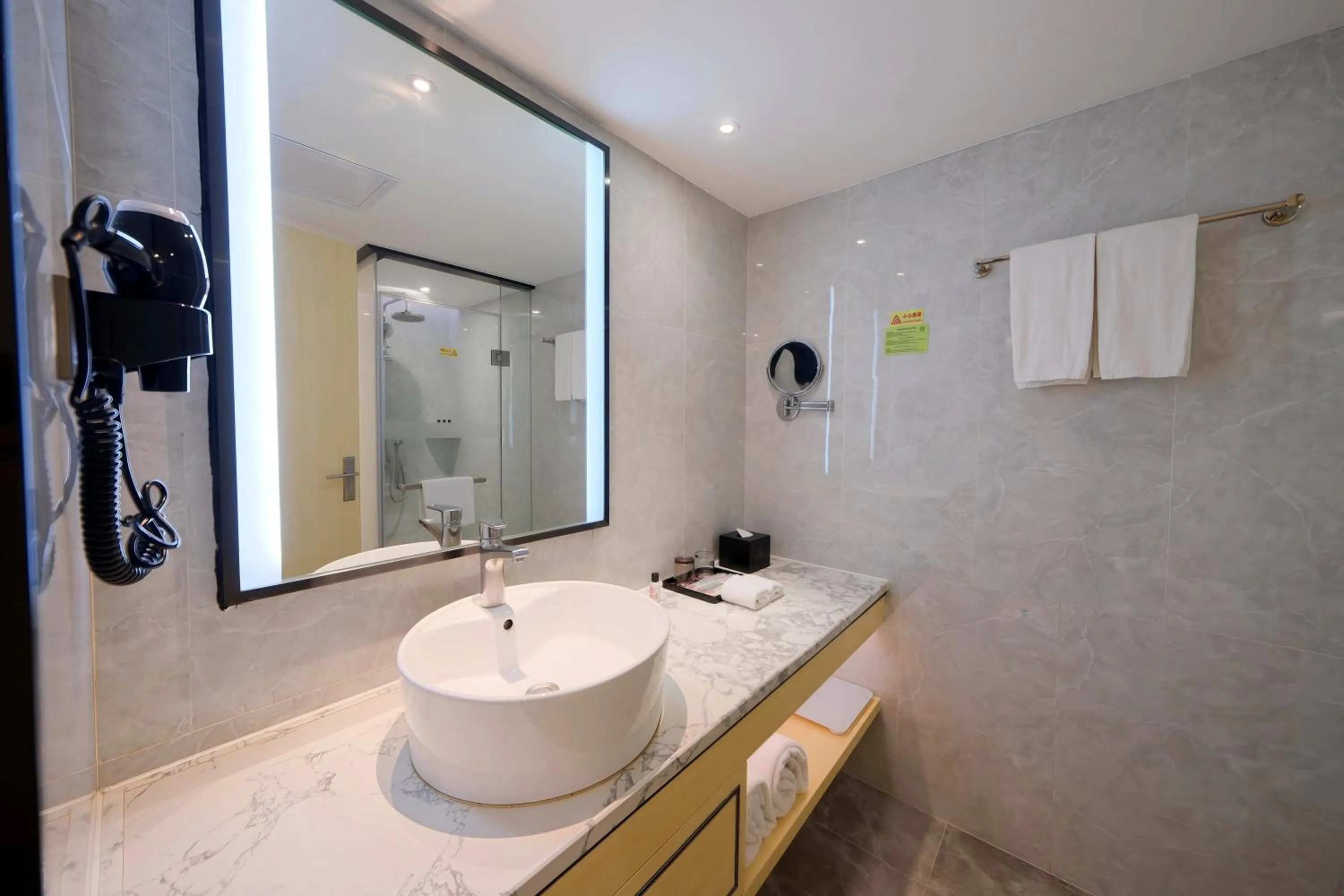 Toilet in Landmark International Hotel