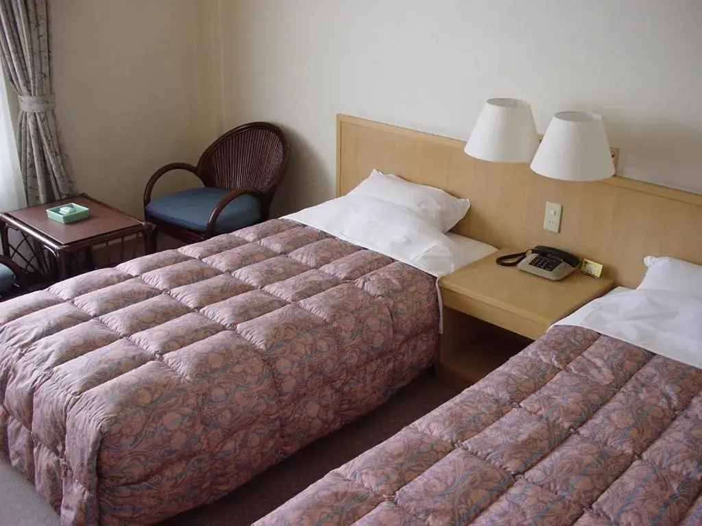 Bed in Kaike Grand Hotel Tensui Bed in Kaike Grand Hotel Tensui