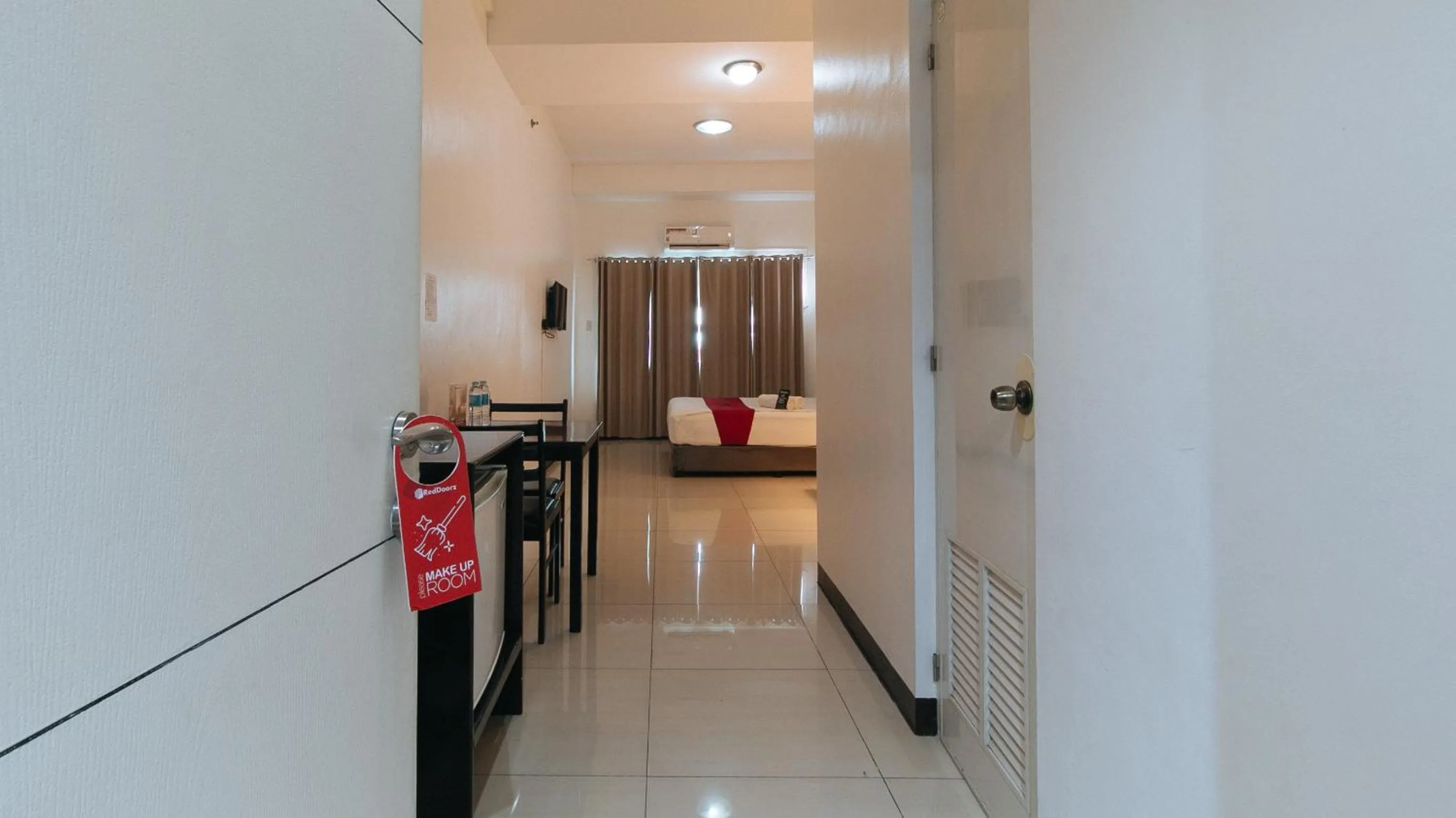 Bed in RedDoorz Plus at Banawe Quezon City