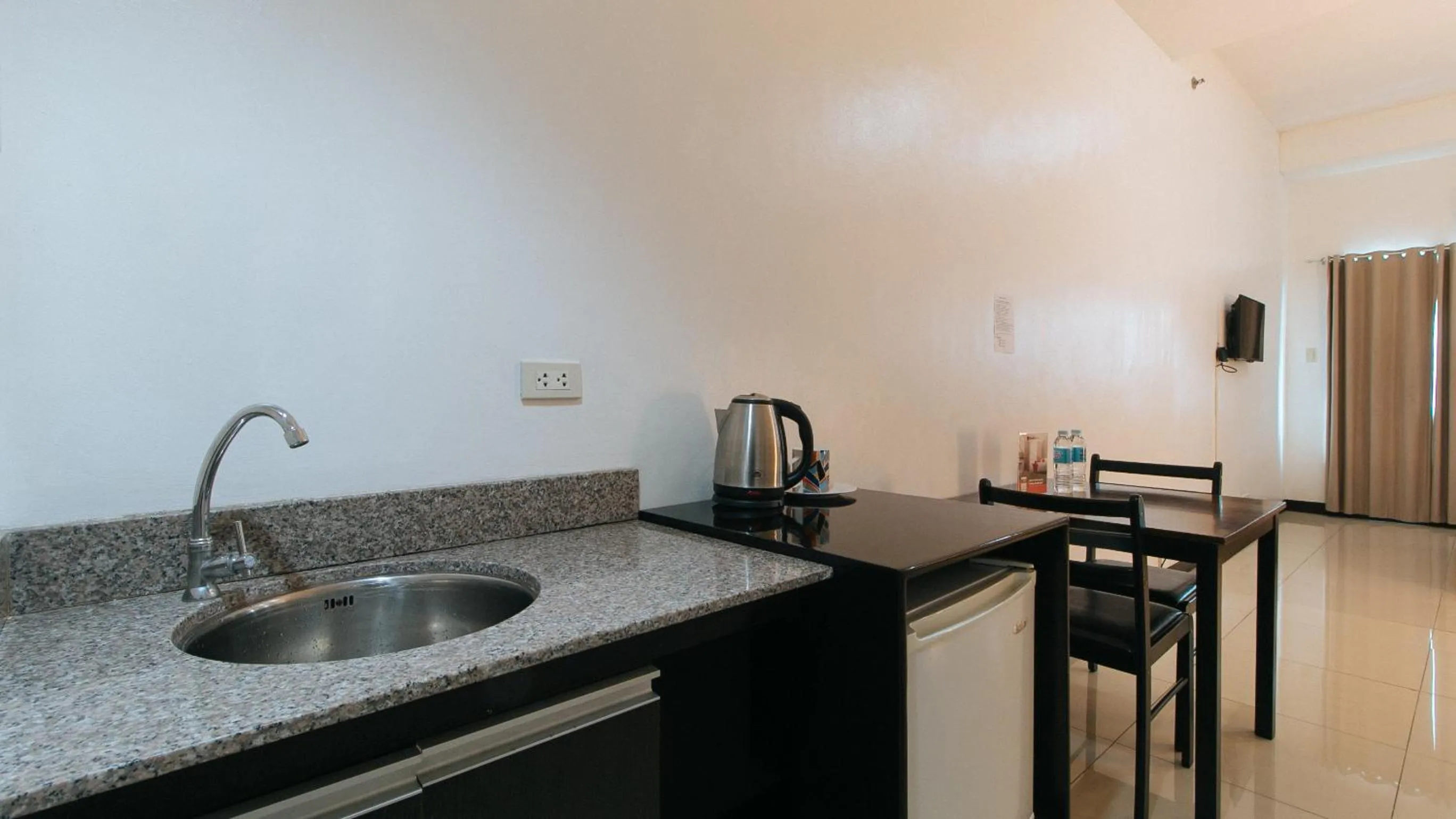 kitchen in RedDoorz Plus at Banawe Quezon City