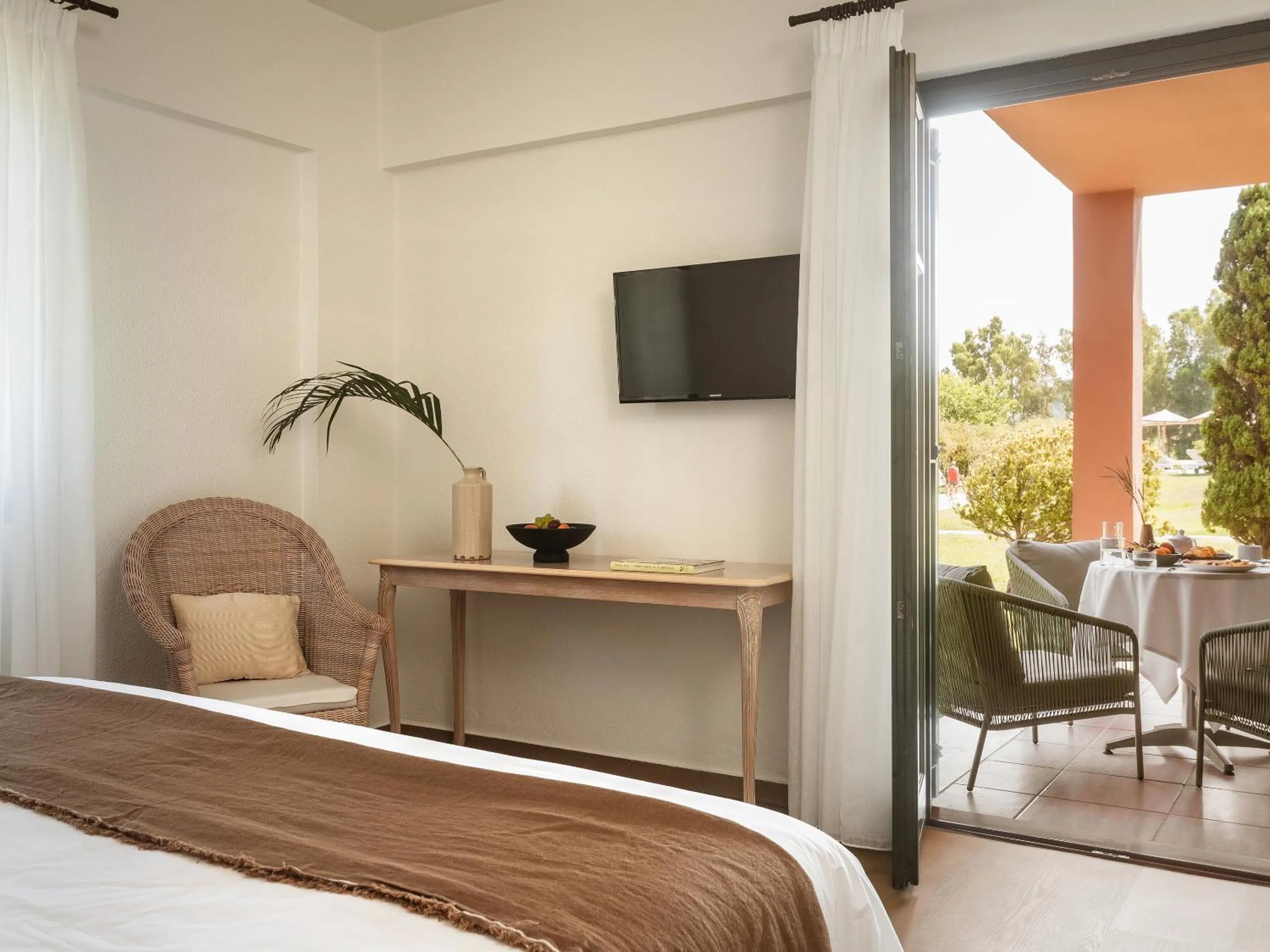 Seating area, Bed in Grecotel LUXME Costa Botanica