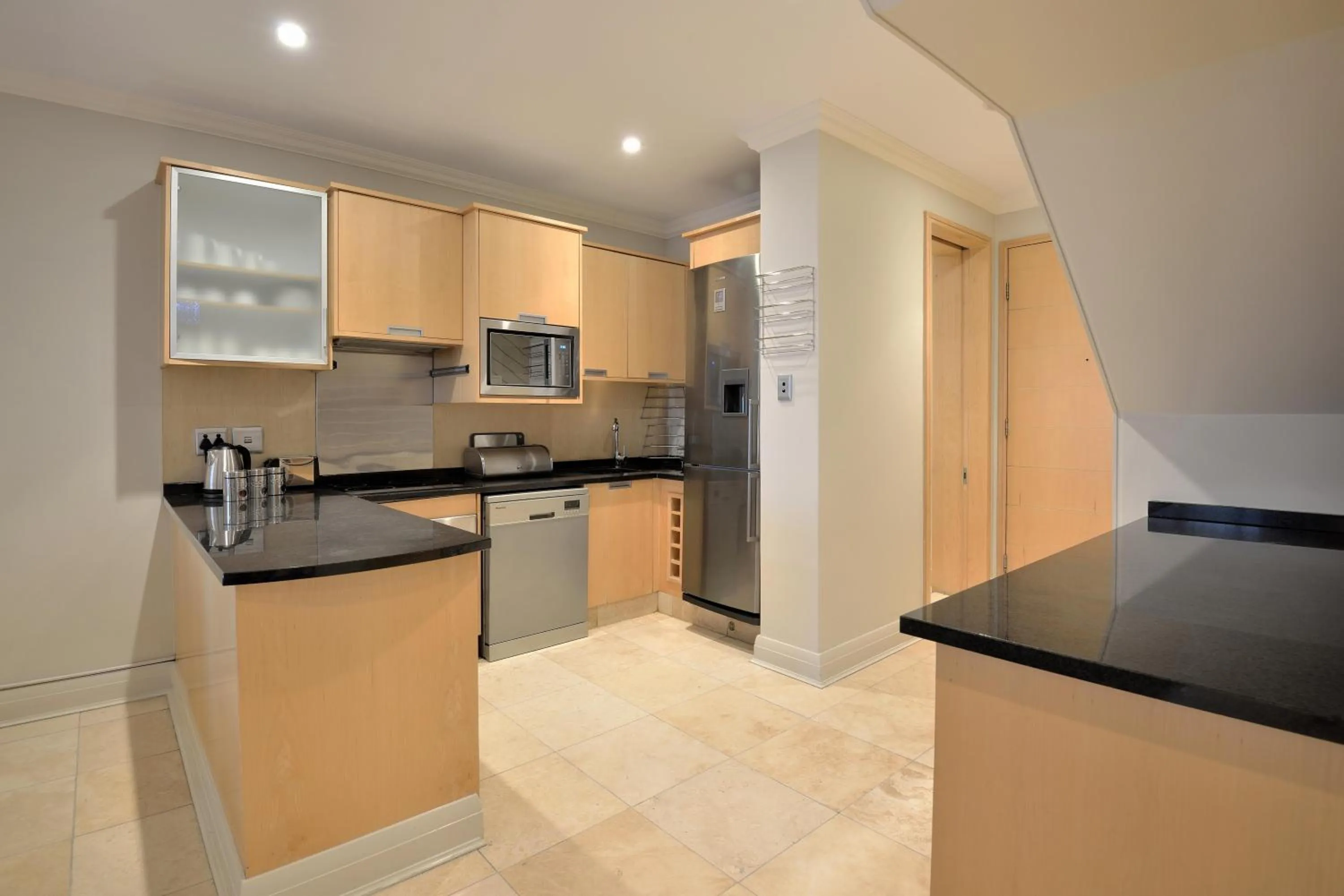 Kitchen or kitchenette in The Michelangelo Towers
