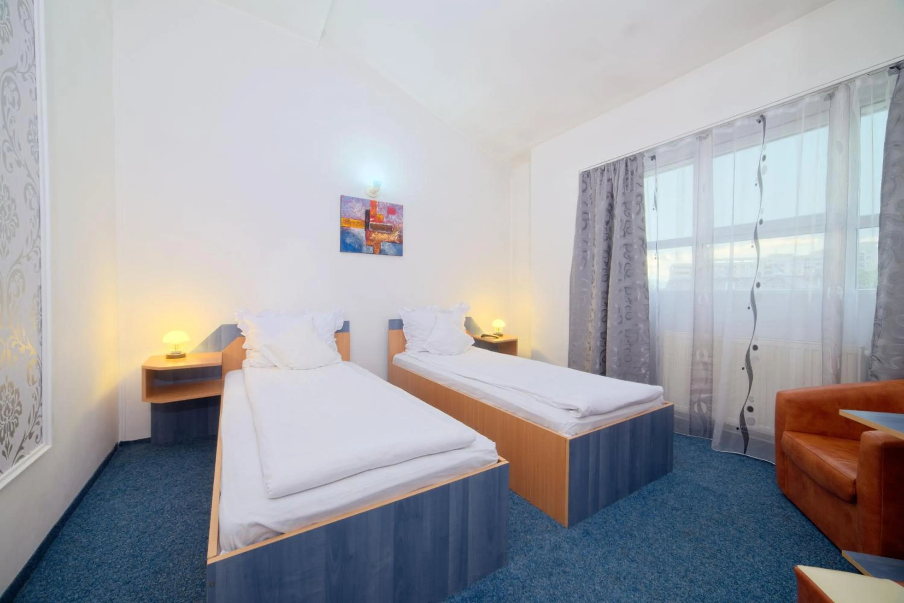 Photo of the whole room, Bed in Pensiunea Leo