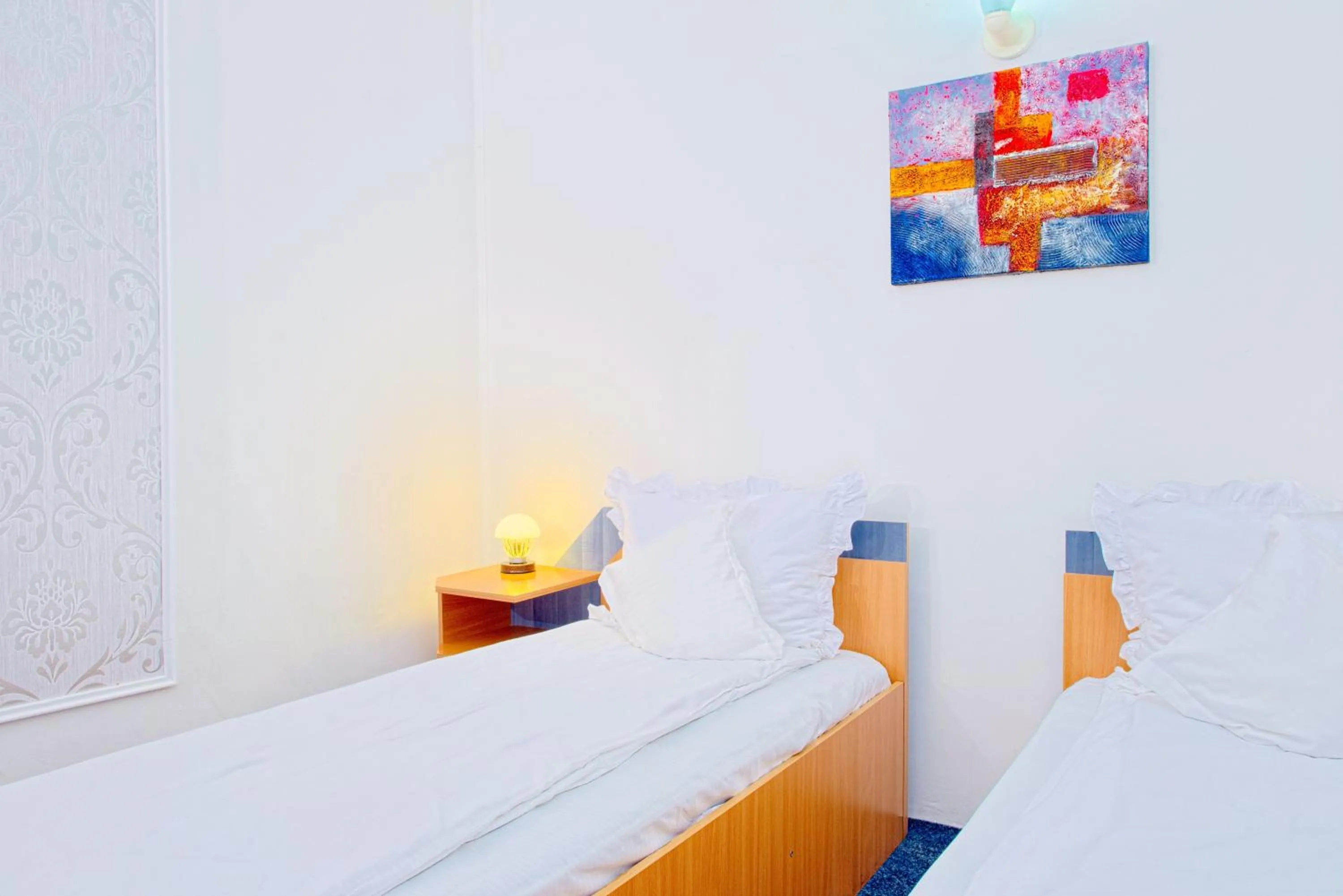 Bed in Pensiunea Leo