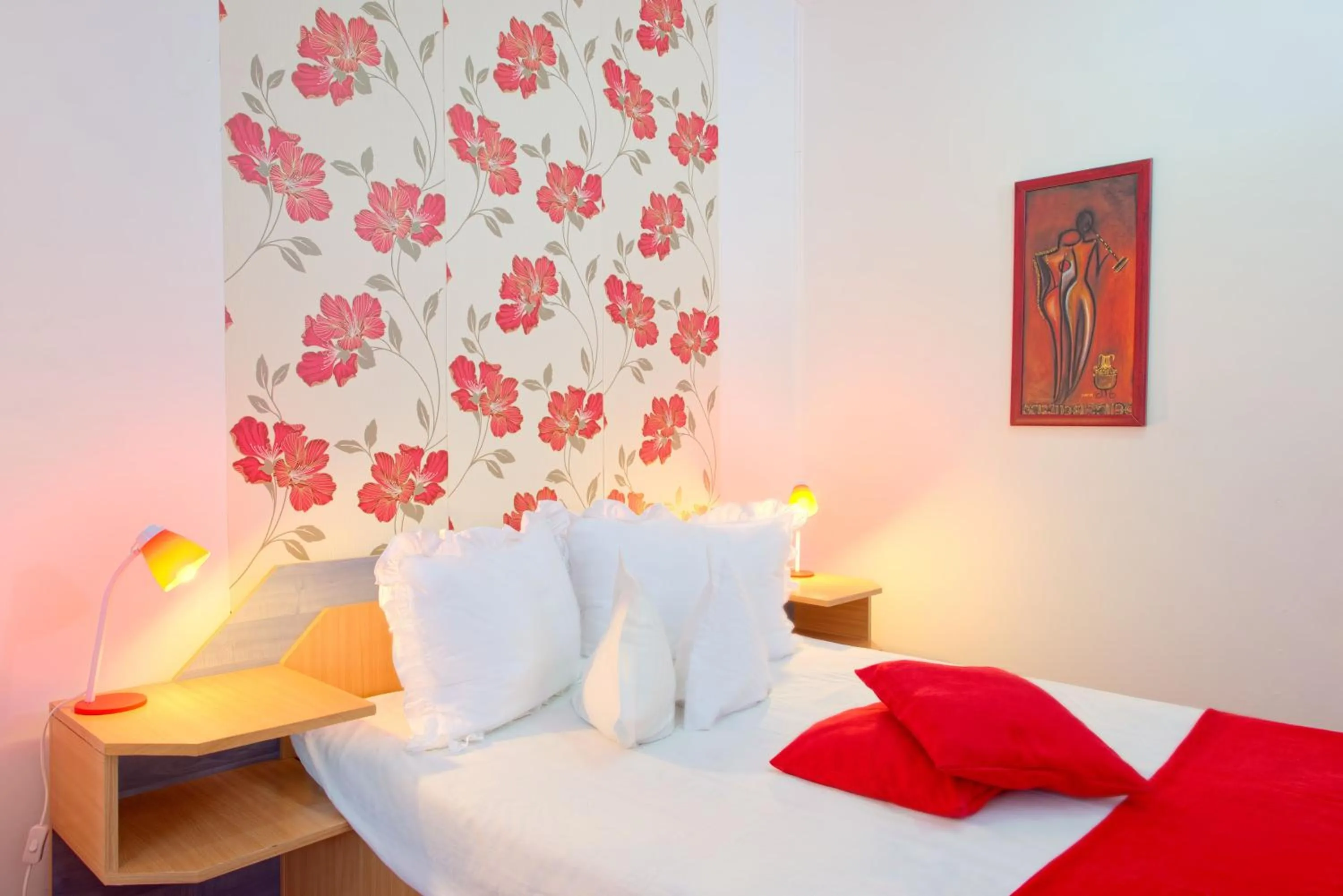 Bed in Pensiunea Leo