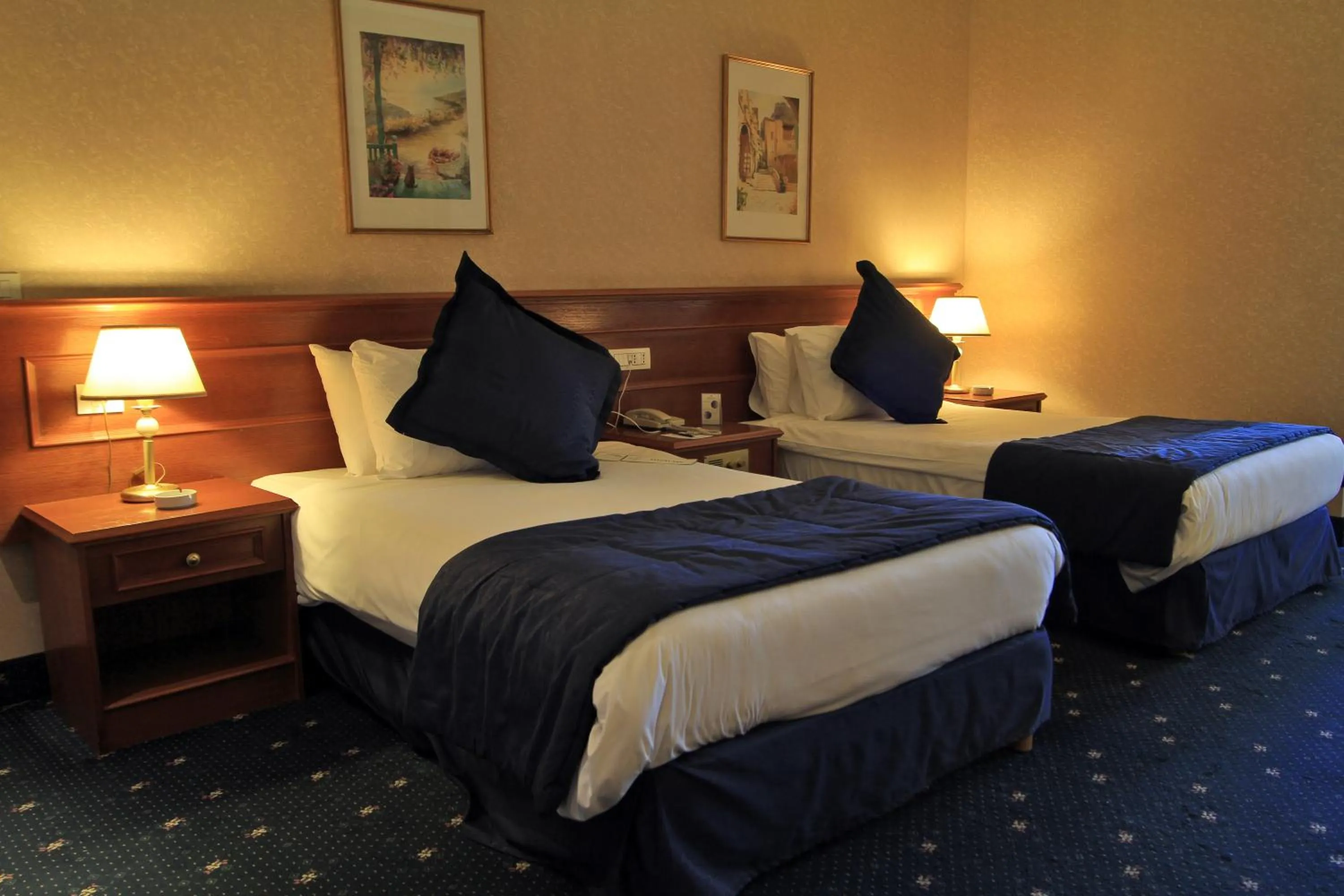 Bed in Bayview Hotel Beirut