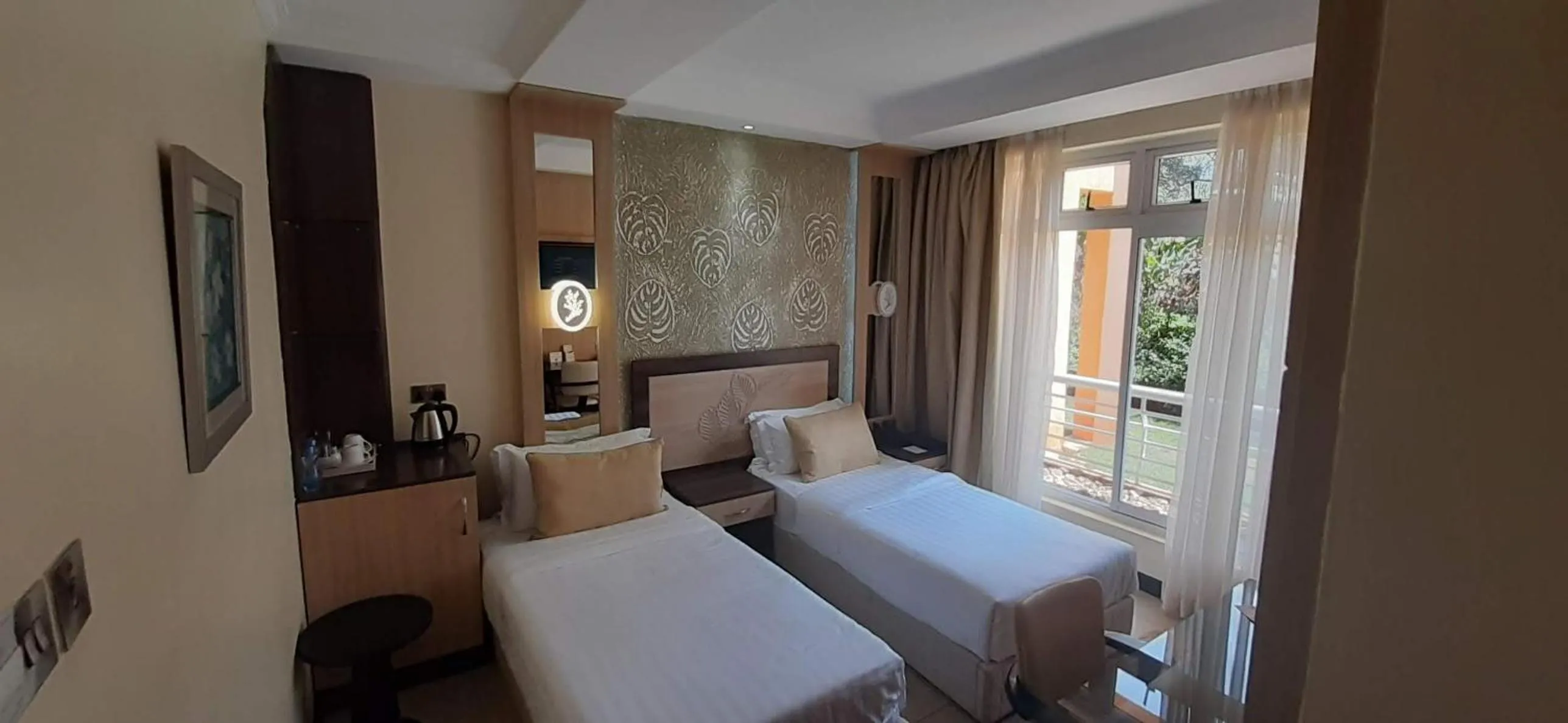 Bed in Elysian Resort