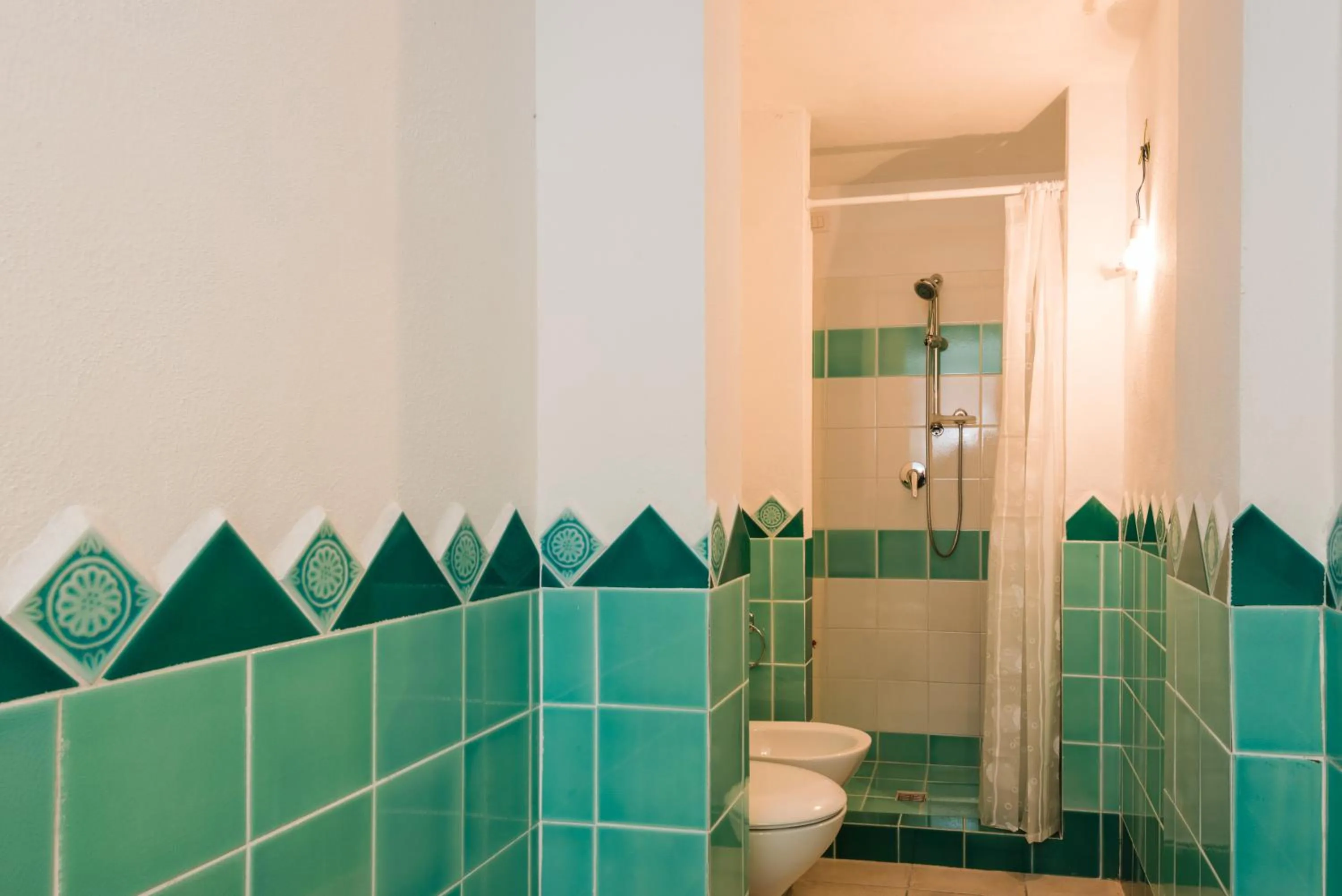 Shower in Apartment in S'Abba e Sa Pedra complex with pool