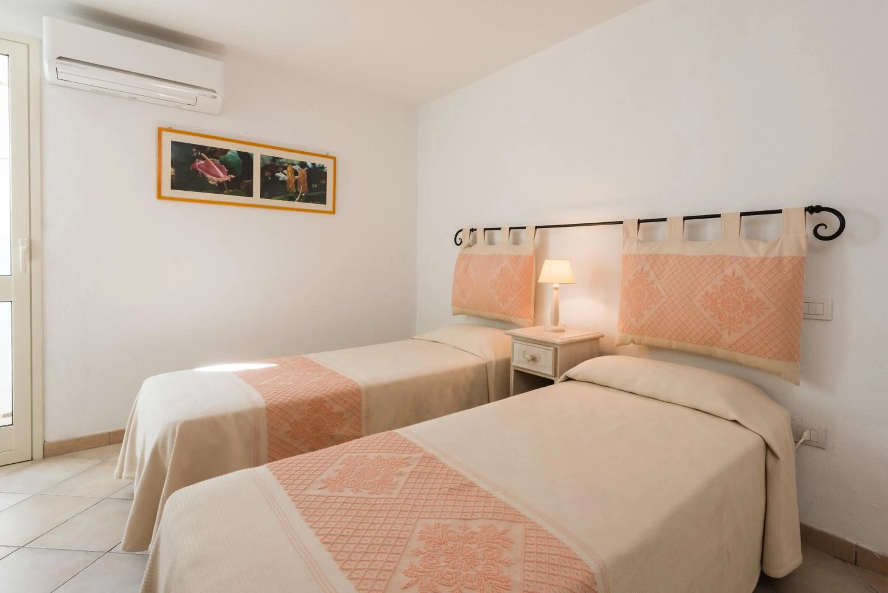 Bed in Apartment in S'Abba e Sa Pedra complex with pool