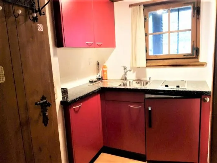 Kitchen or kitchenette in B & B Brienz