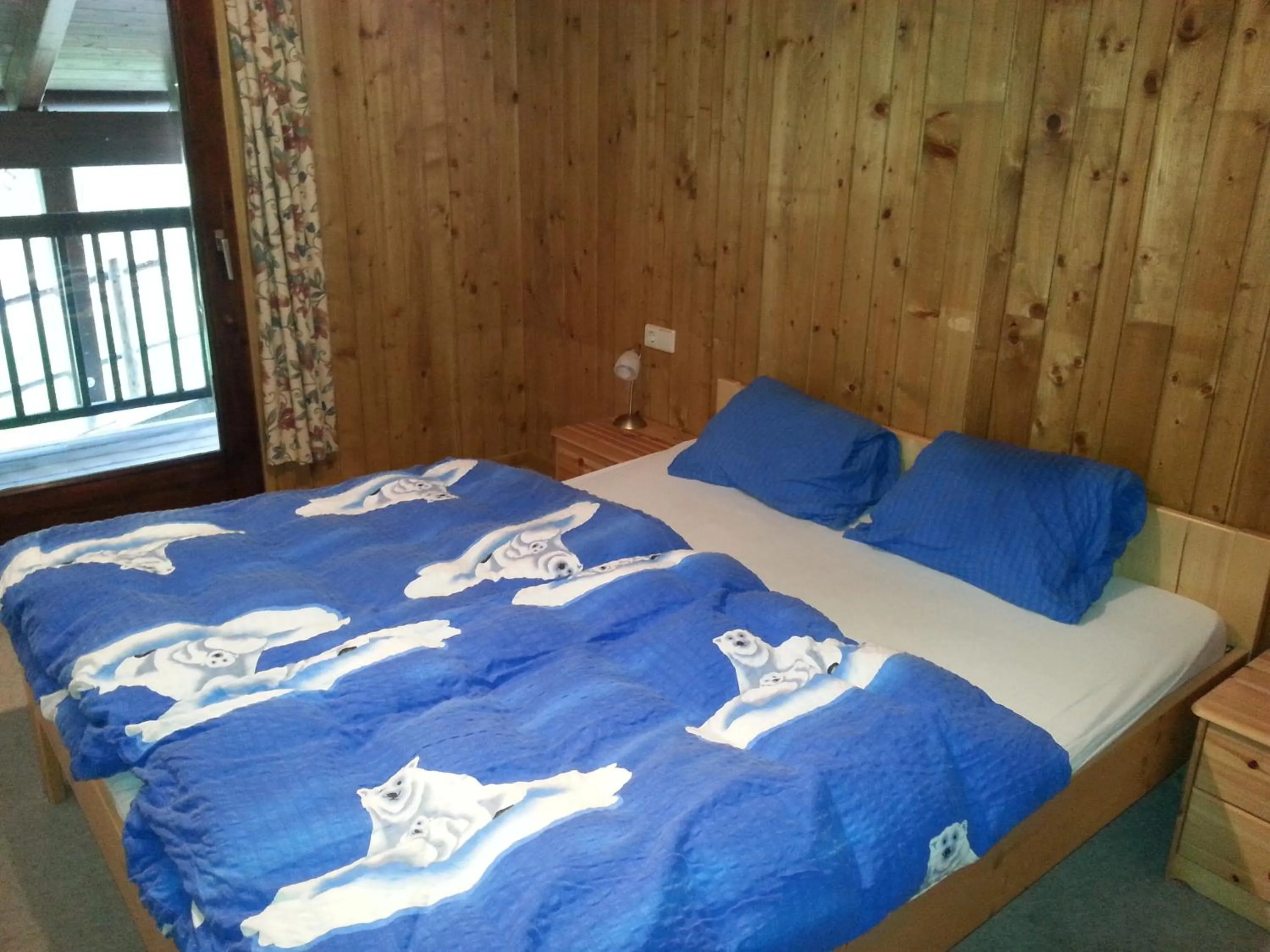 Bedroom in Fichtenblockhütte