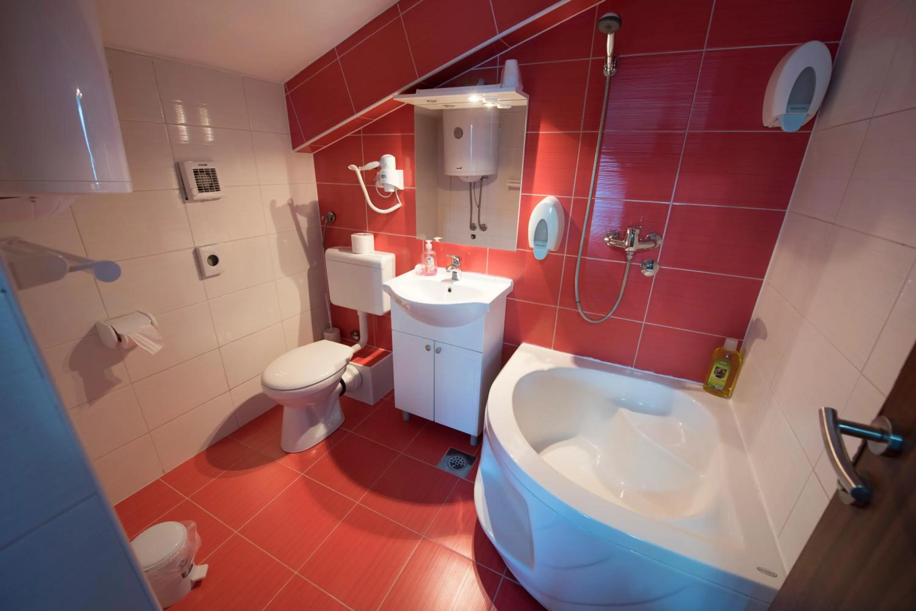 Toilet in Hotel Oasis