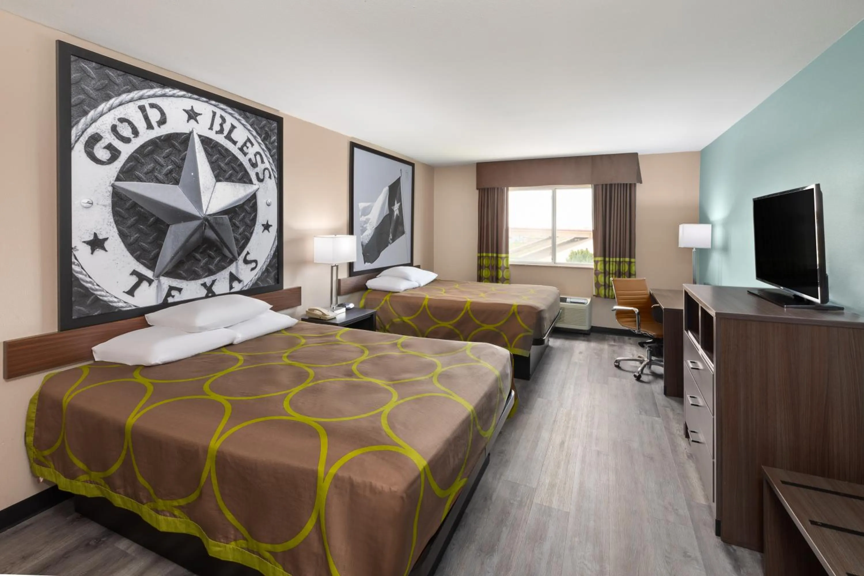 Bed in Super 8 by Wyndham Lubbock West