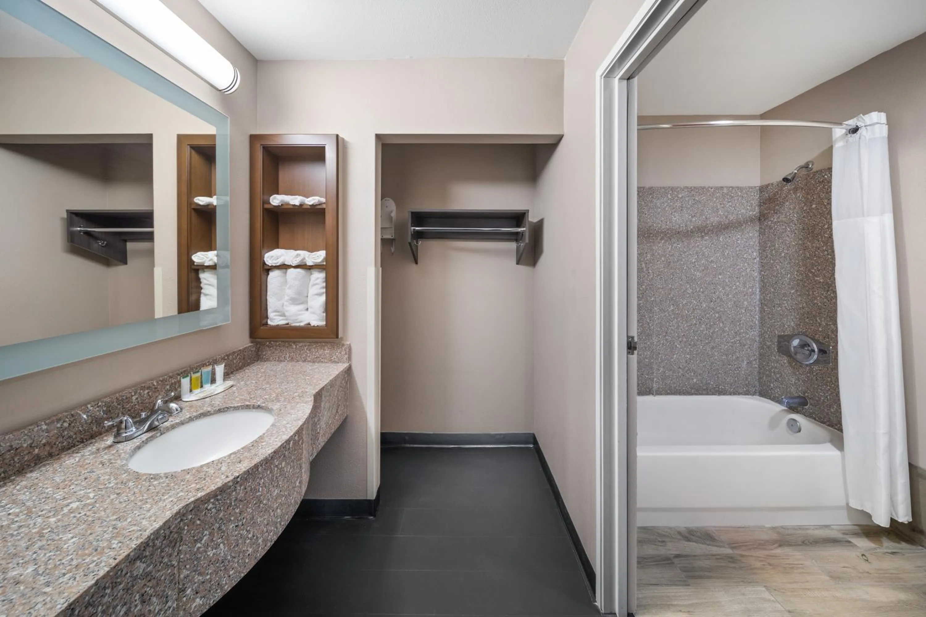 Bathroom in Super 8 by Wyndham Lubbock West