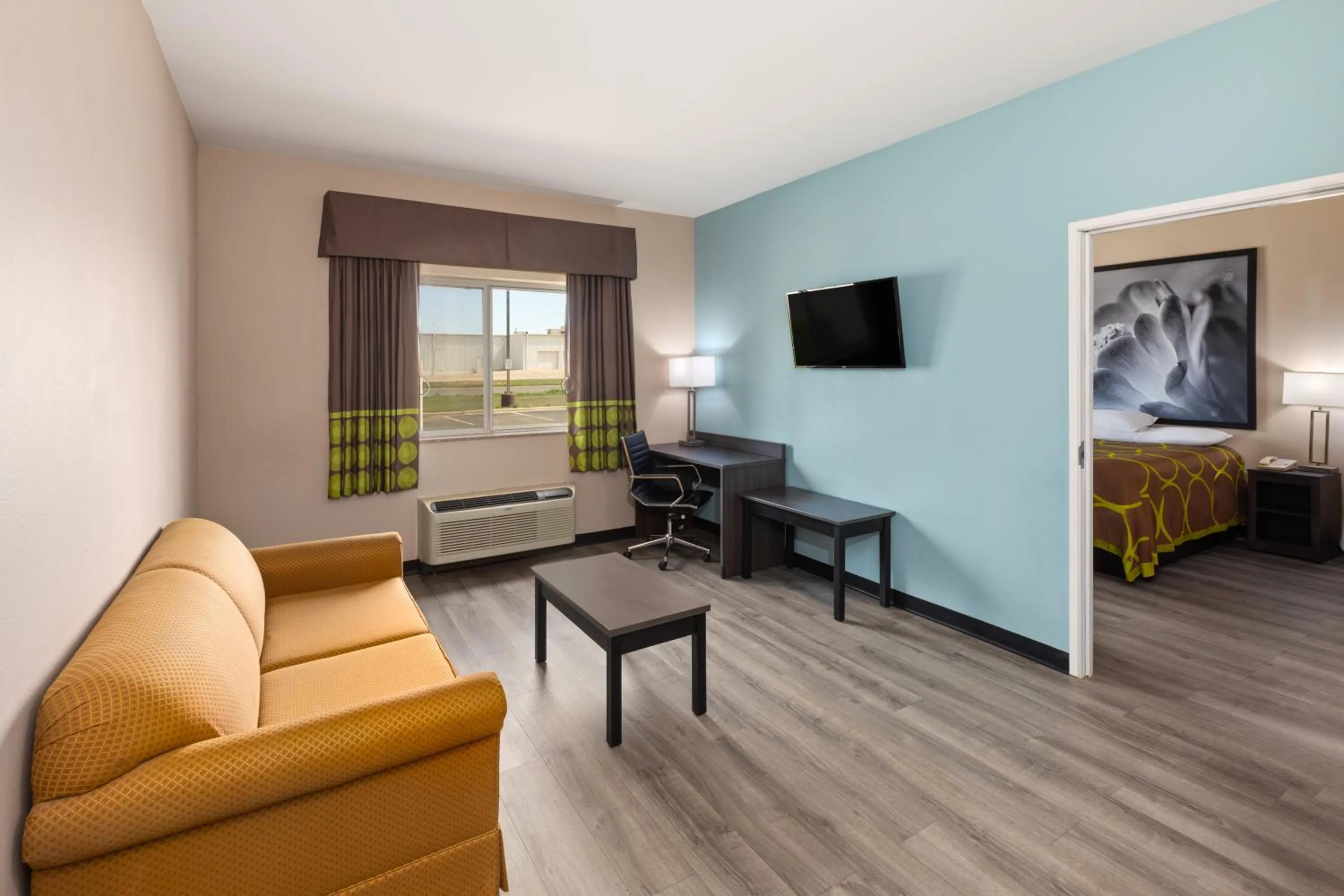 Living room, Bed in Super 8 by Wyndham Lubbock West