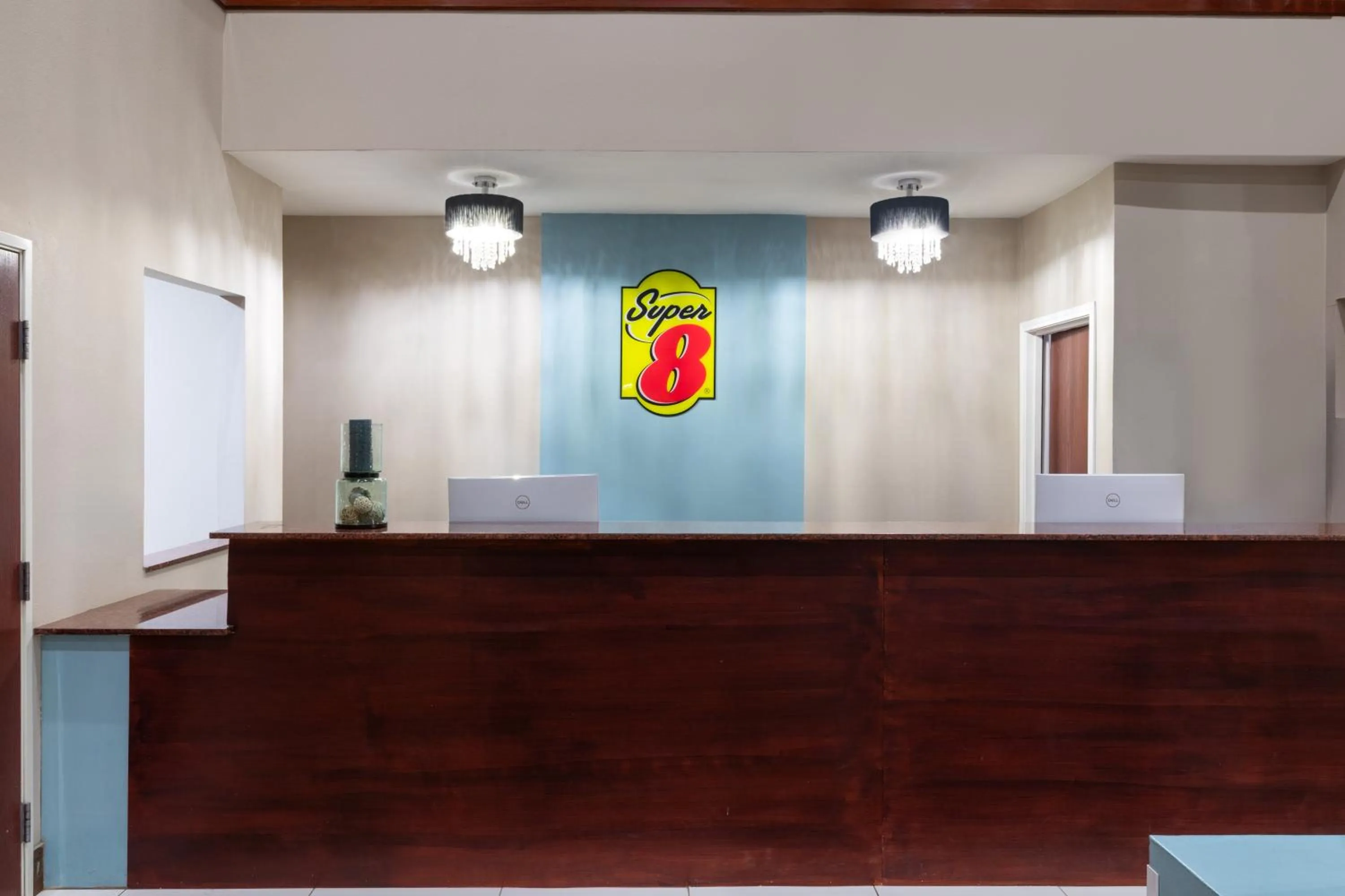 Property logo or sign in Super 8 by Wyndham Lubbock West