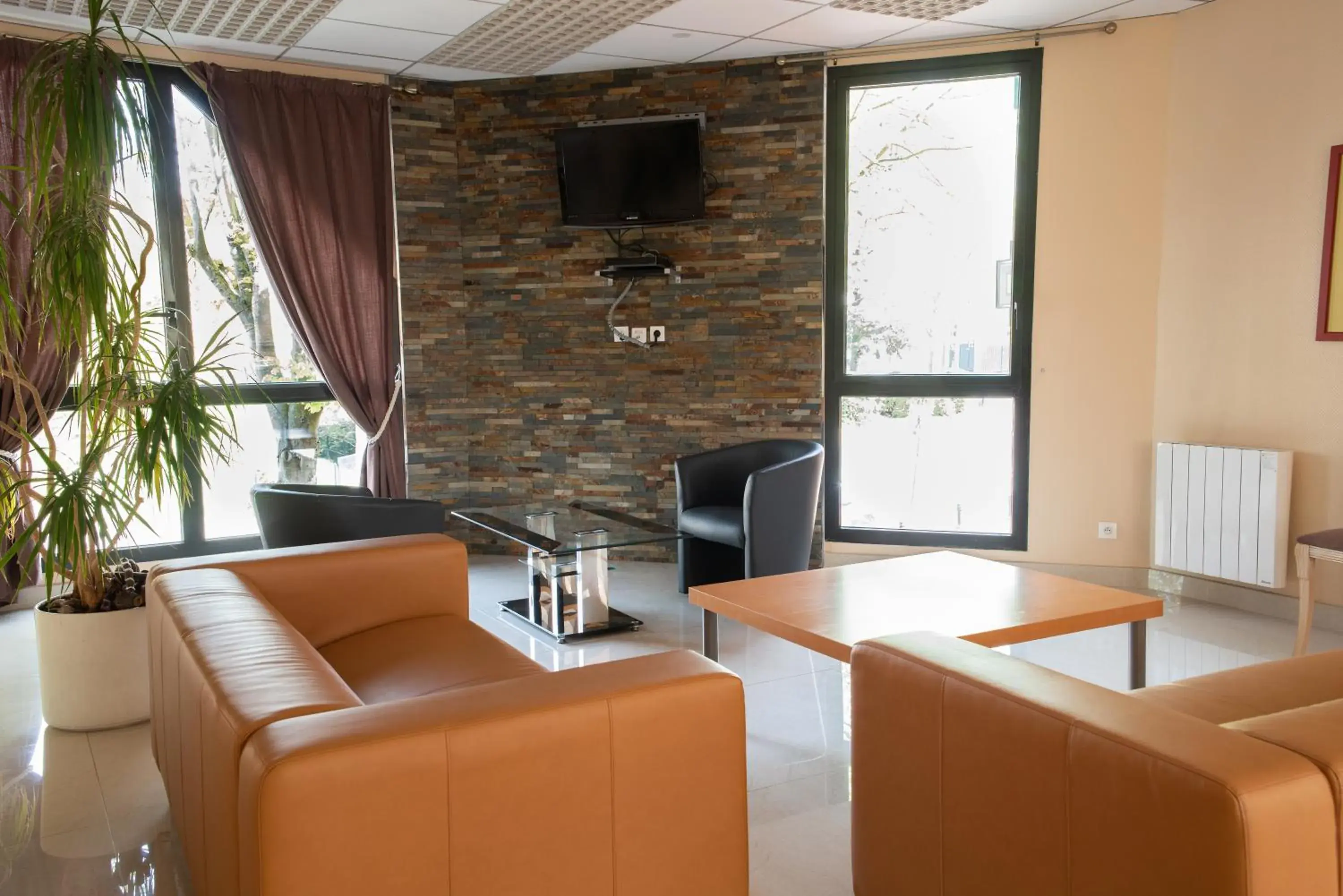 Communal lounge/ TV room, Seating Area in Hôtel Garabel