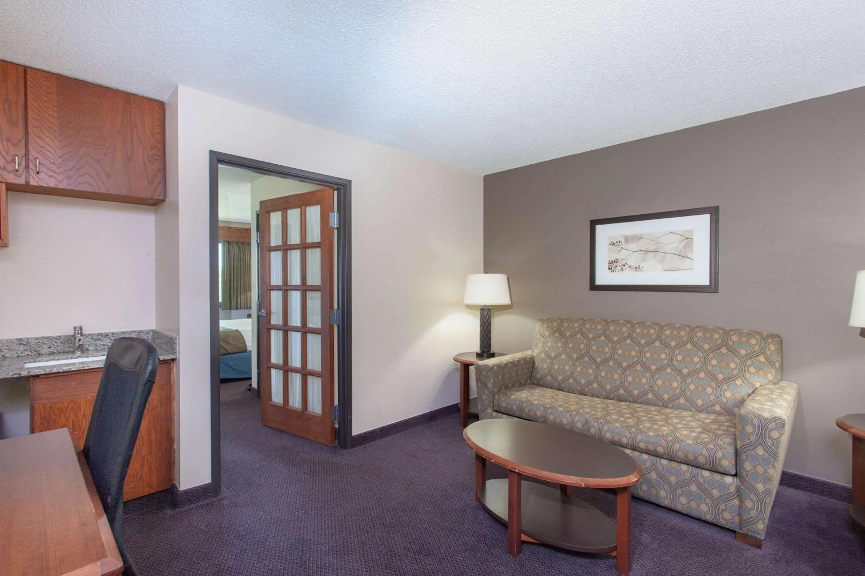 Photo of the whole room in AmericInn by Wyndham Hutchinson