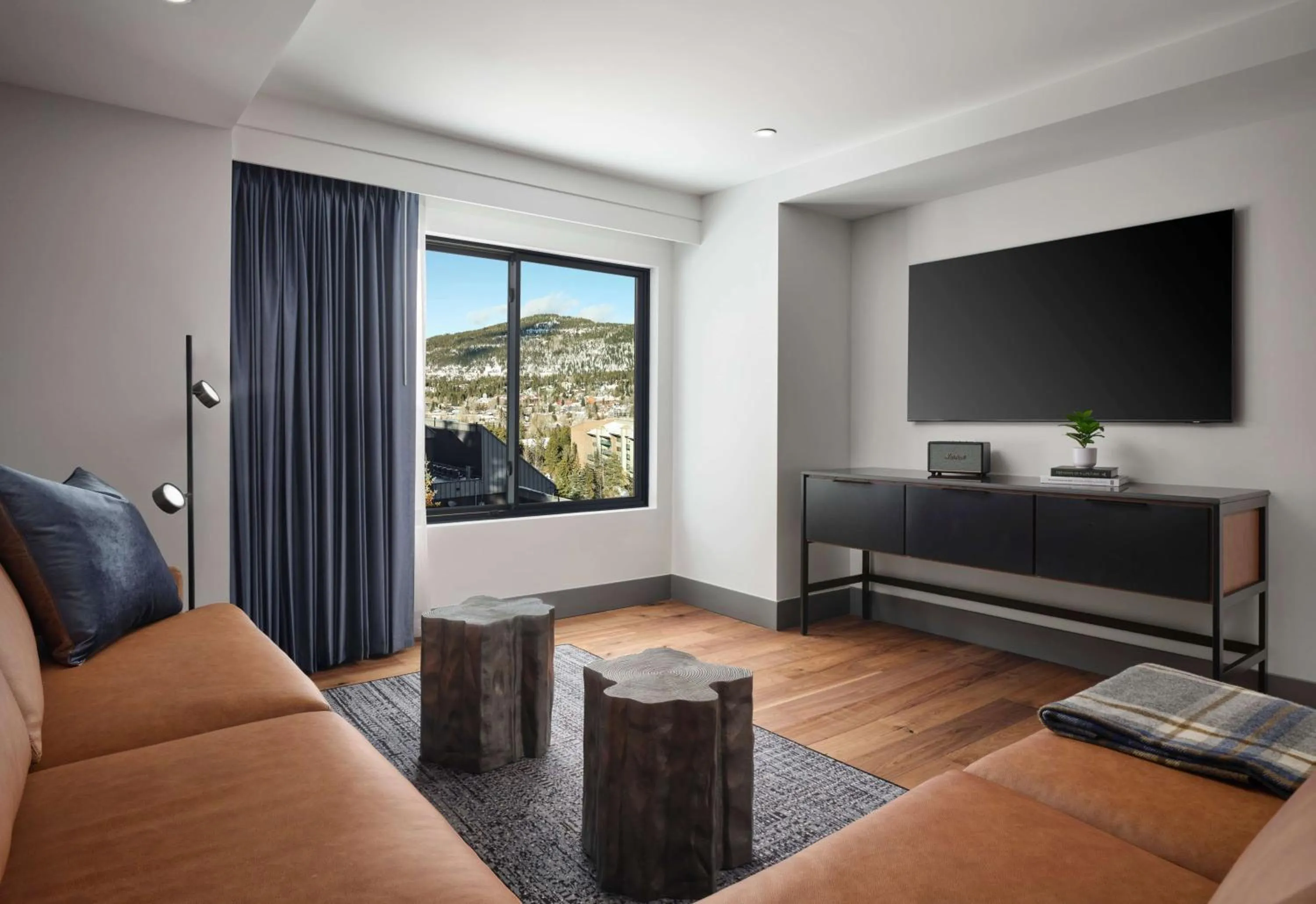 Living room in Hotel Alpenrock Breckenridge, Curio Collection by Hilton