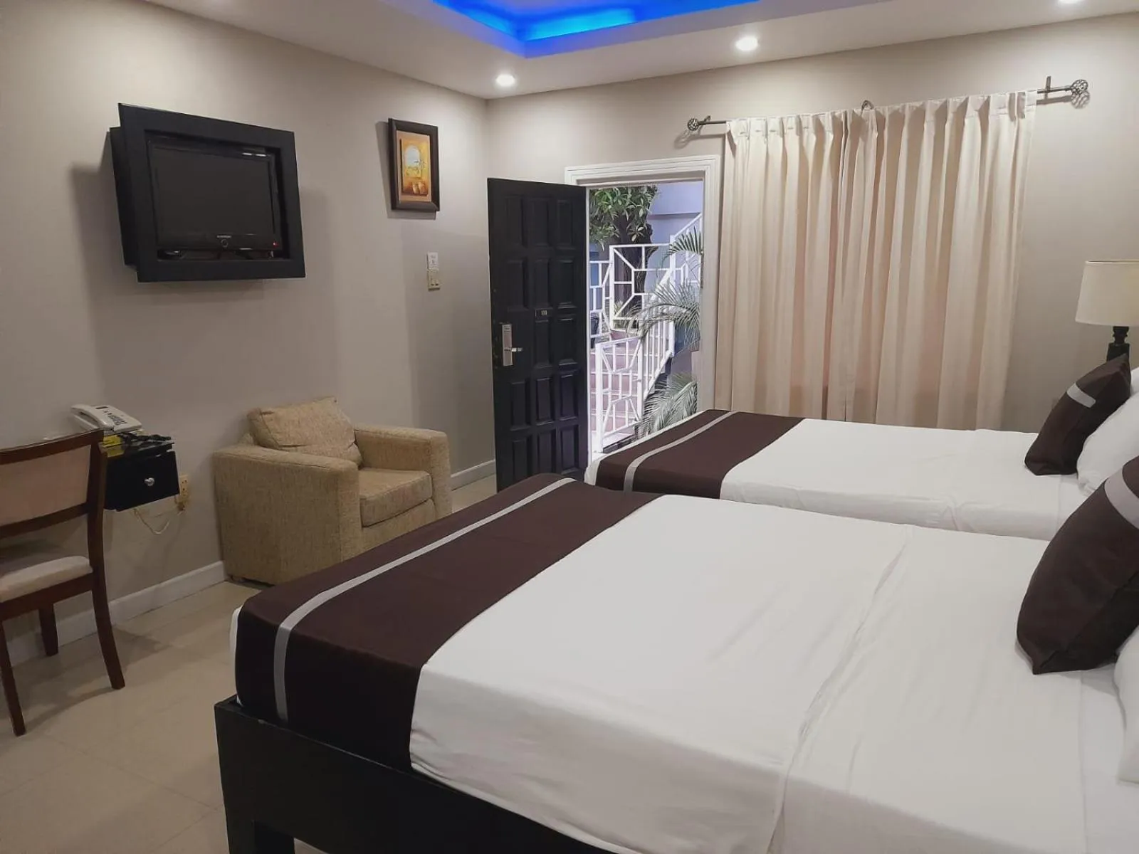 Bed in Christar Villas Hotel