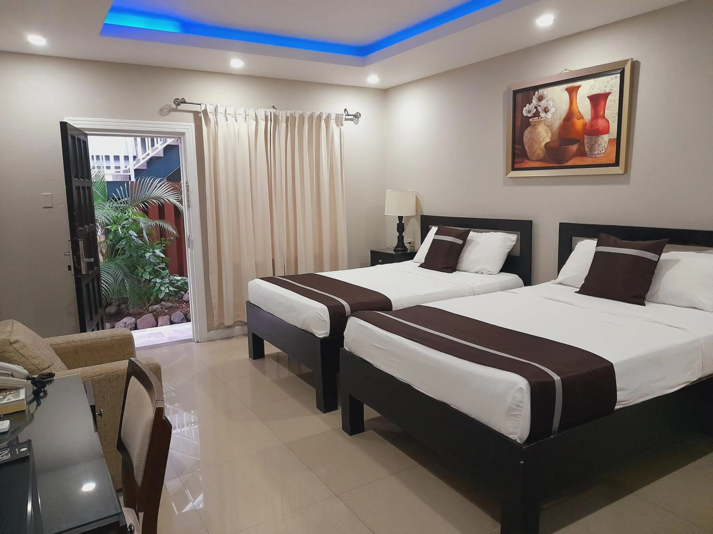 Bed in Christar Villas Hotel