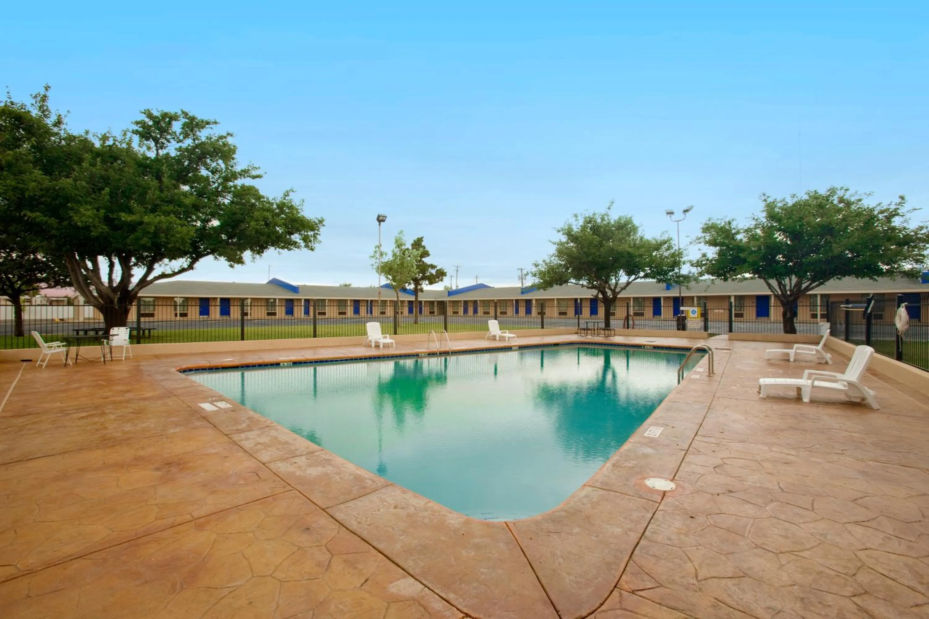 Swimming pool in Americas Best Value Inn Lubbock East