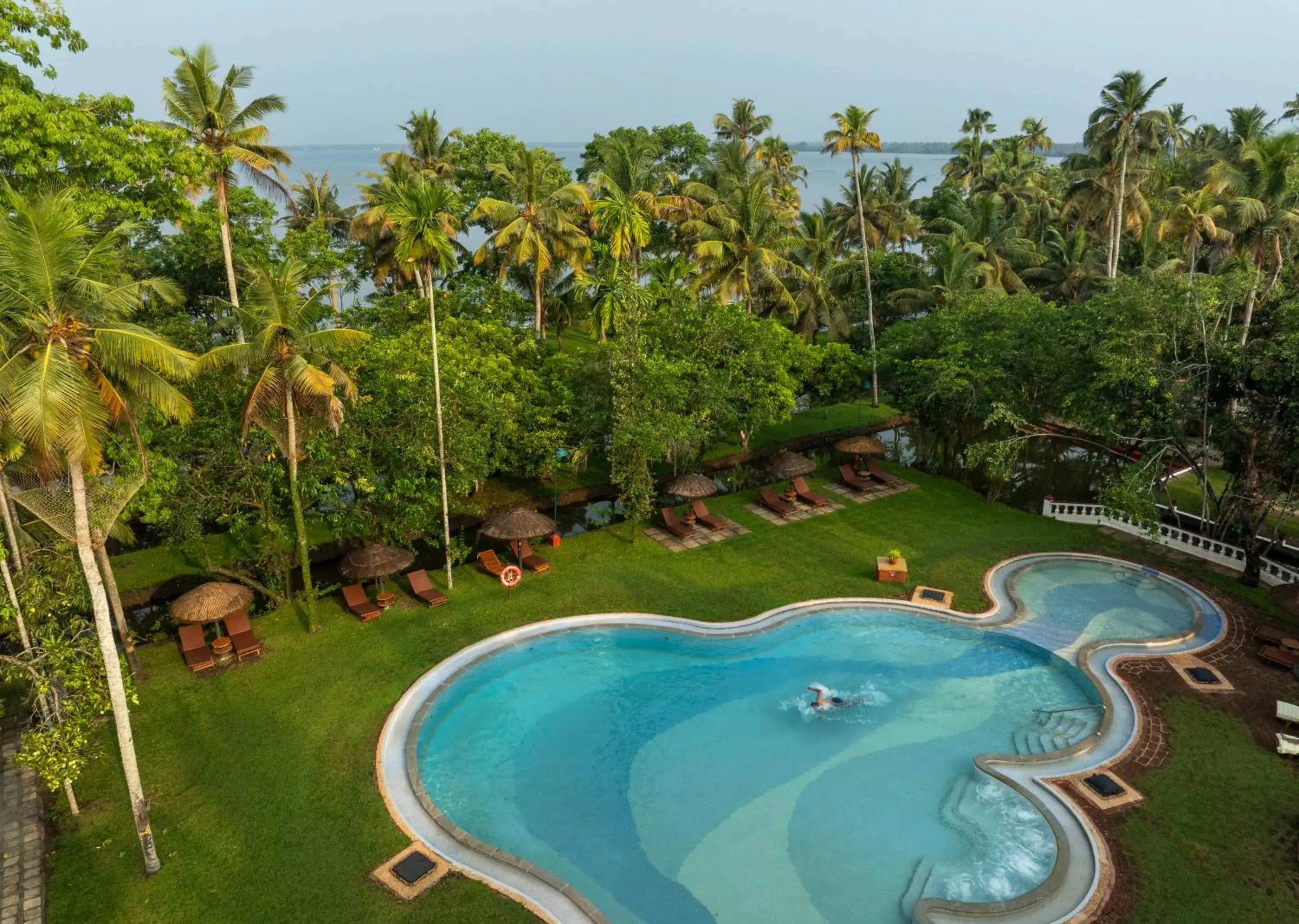 Swimming pool in Coconut Lagoon Kumarakom - A CGH Earth Experience Swimming pool in Coconut Lagoon Kumarakom - A CGH Earth Experience